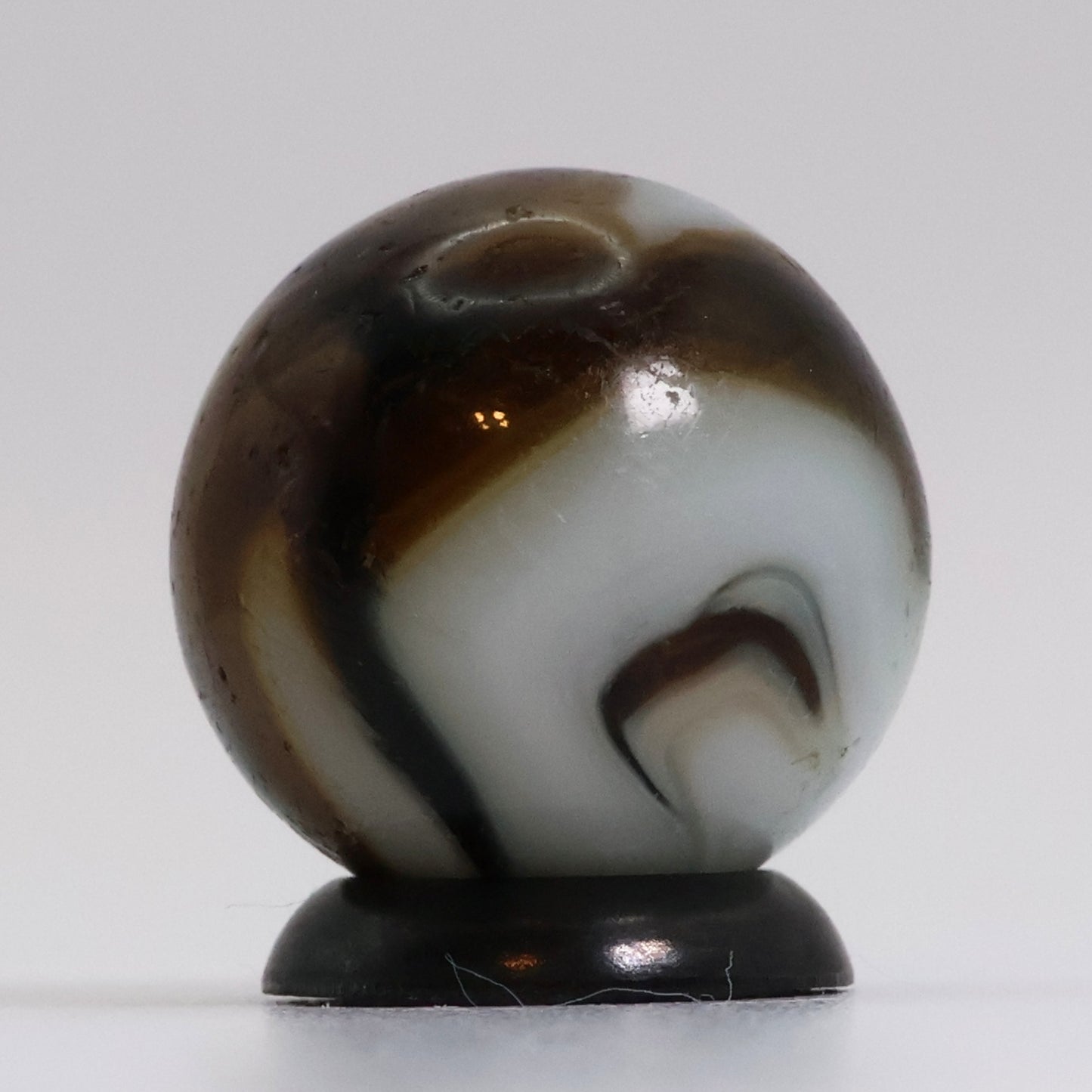 5/8" Translucent Swirl Marble Brown & White NM-