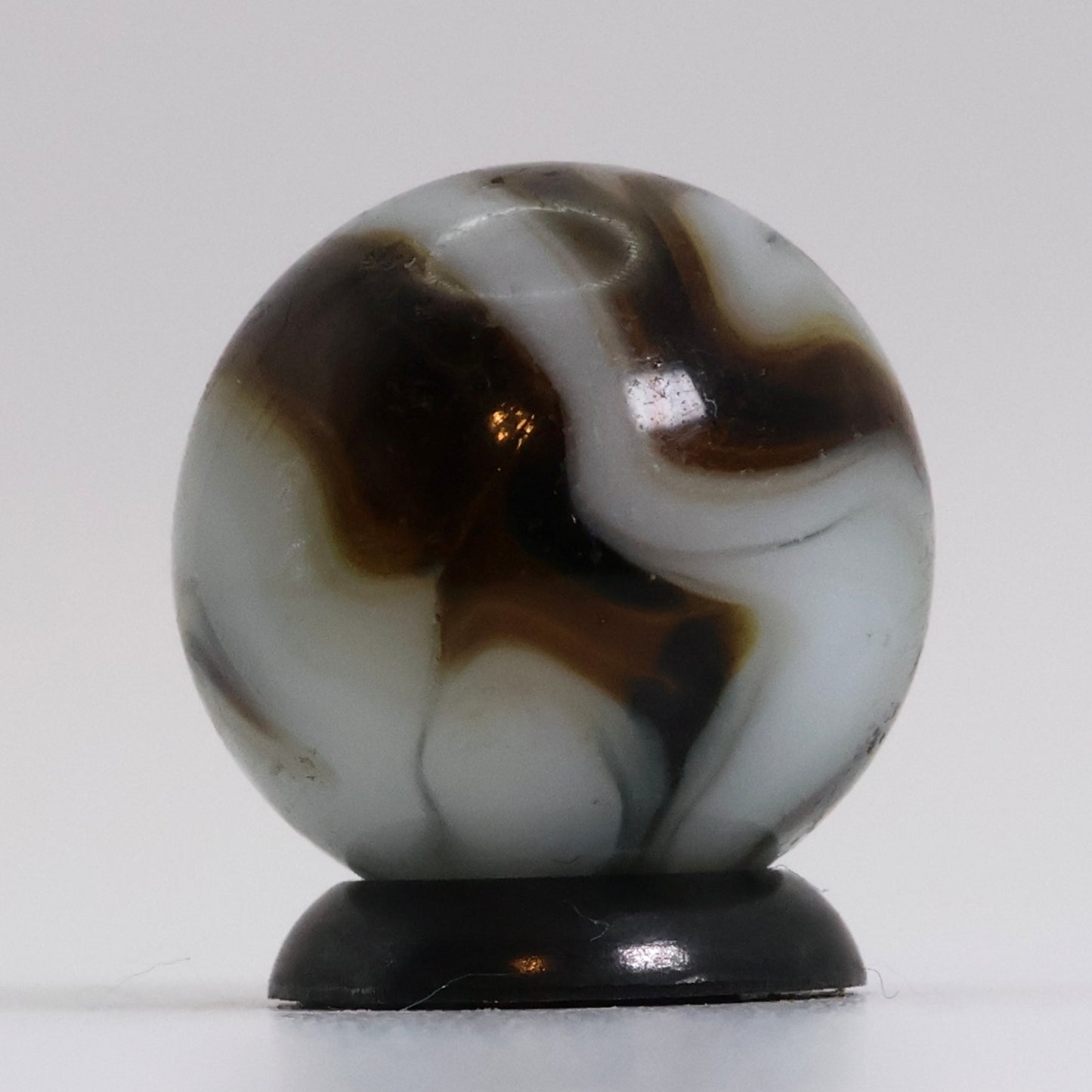 5/8" Translucent Swirl Marble Brown & White NM-