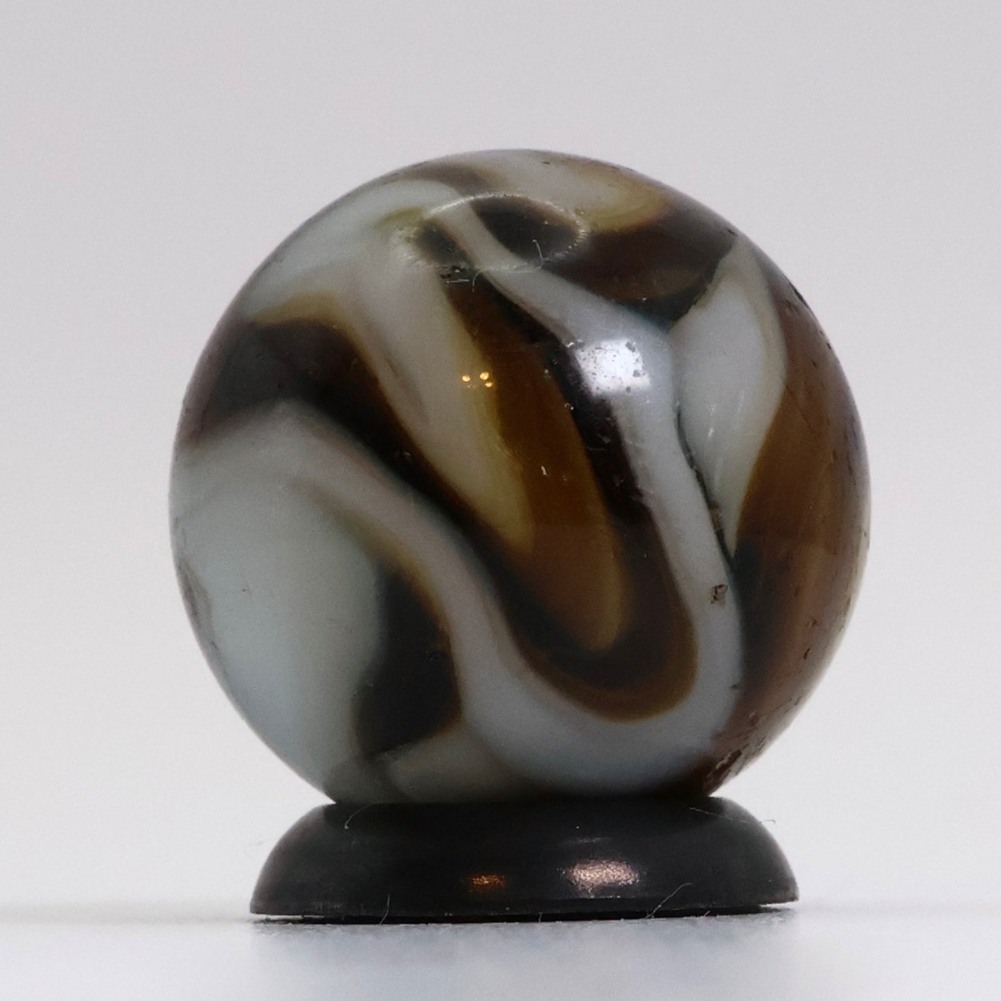 5/8" Translucent Swirl Marble Brown & White NM-