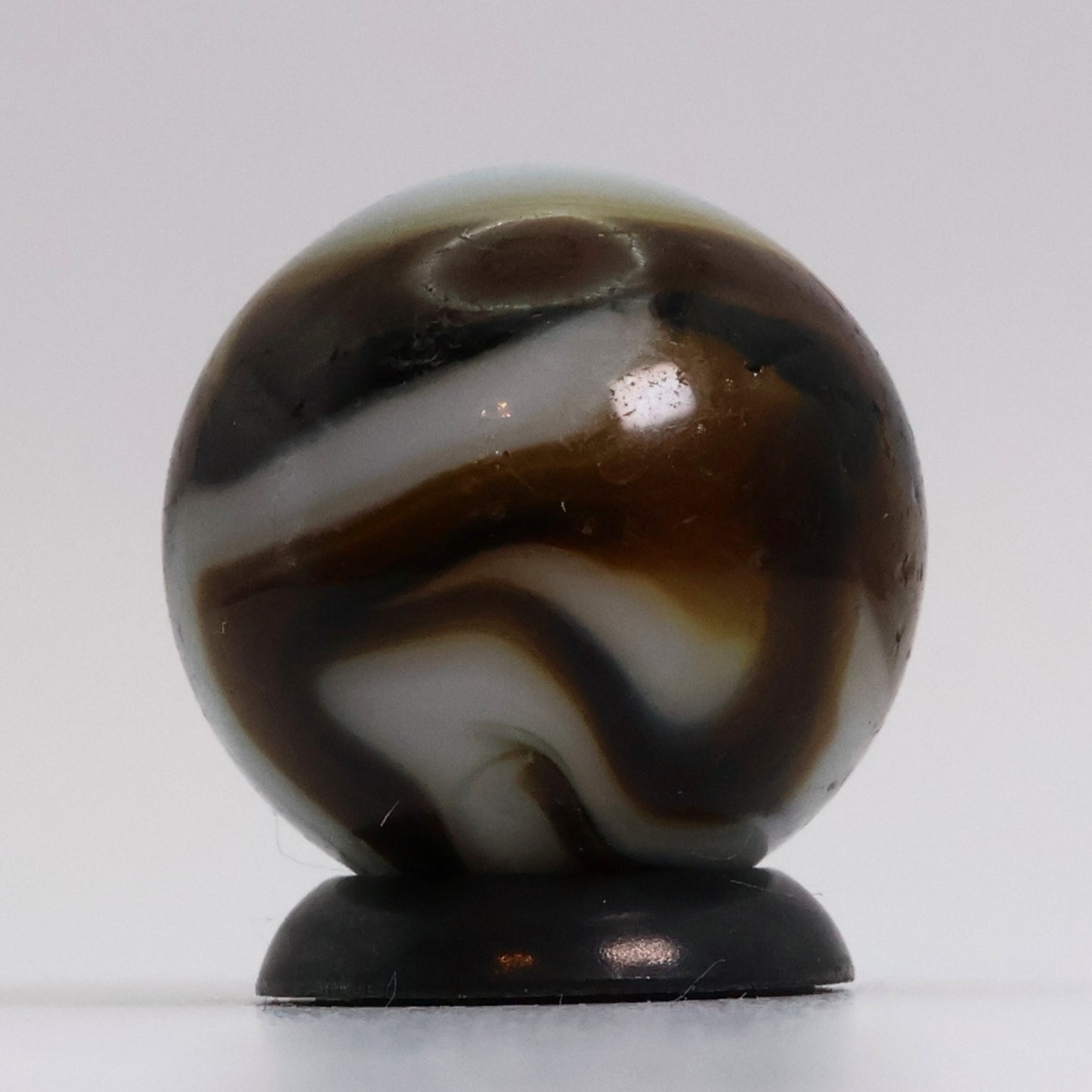 5/8" Translucent Swirl Marble Brown & White NM-