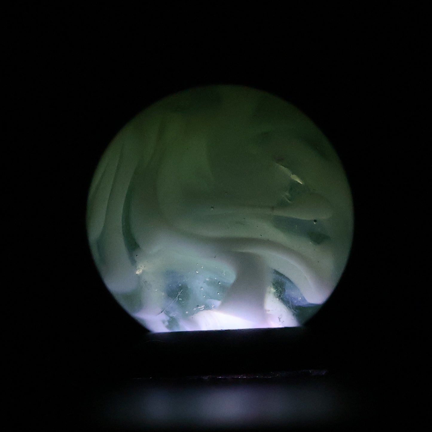5/8" Translucent Green Marble with white ribbons busy pattern NM