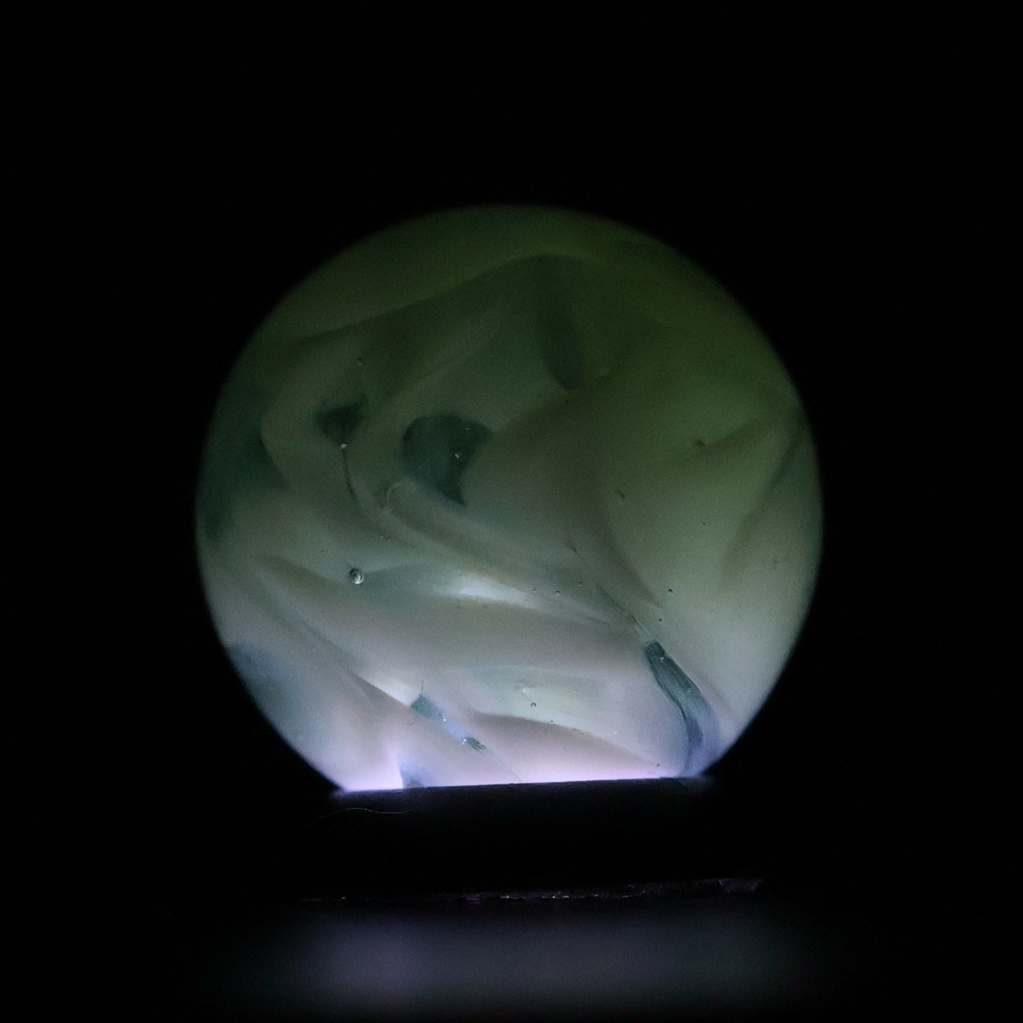 5/8" Translucent Green Marble with white ribbons busy pattern NM