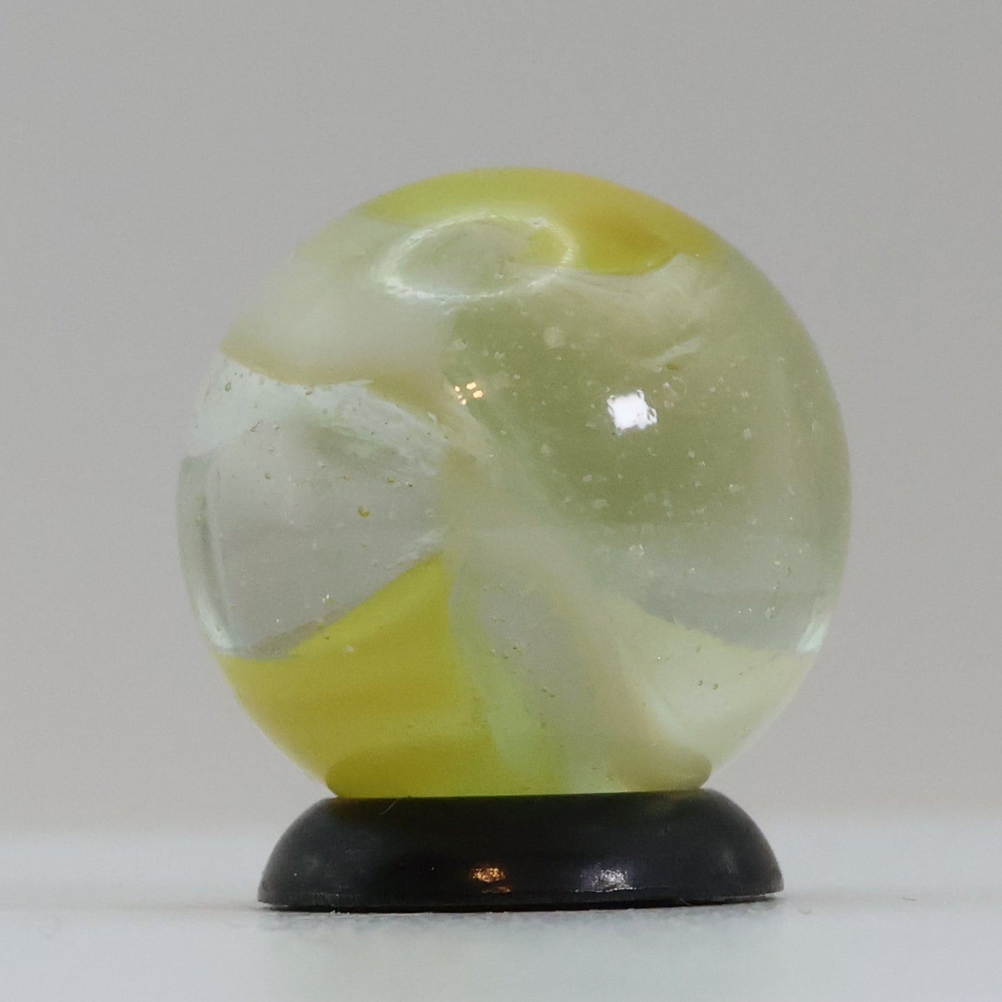 11/16" Peliter Rainbo Clear Based Marble Yellow & White M-