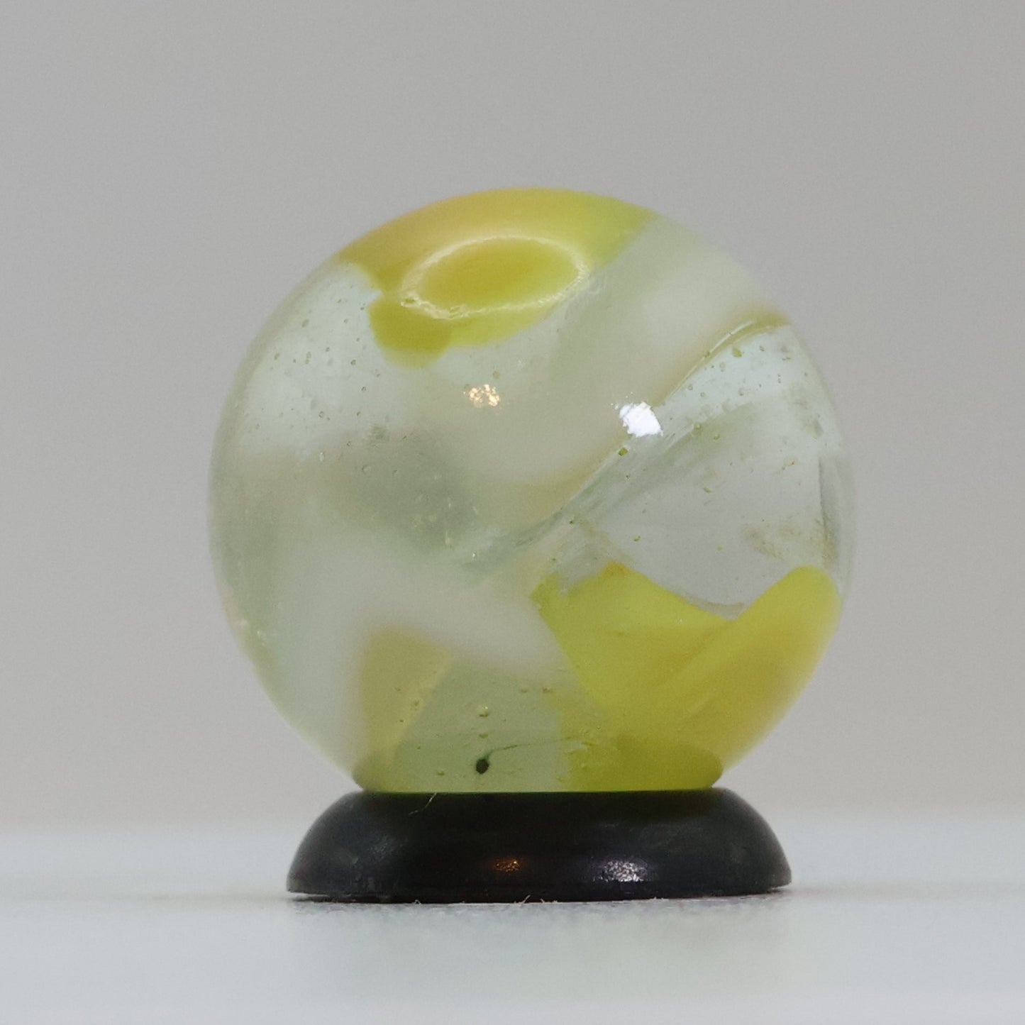 11/16" Peliter Rainbo Clear Based Marble Yellow & White M-