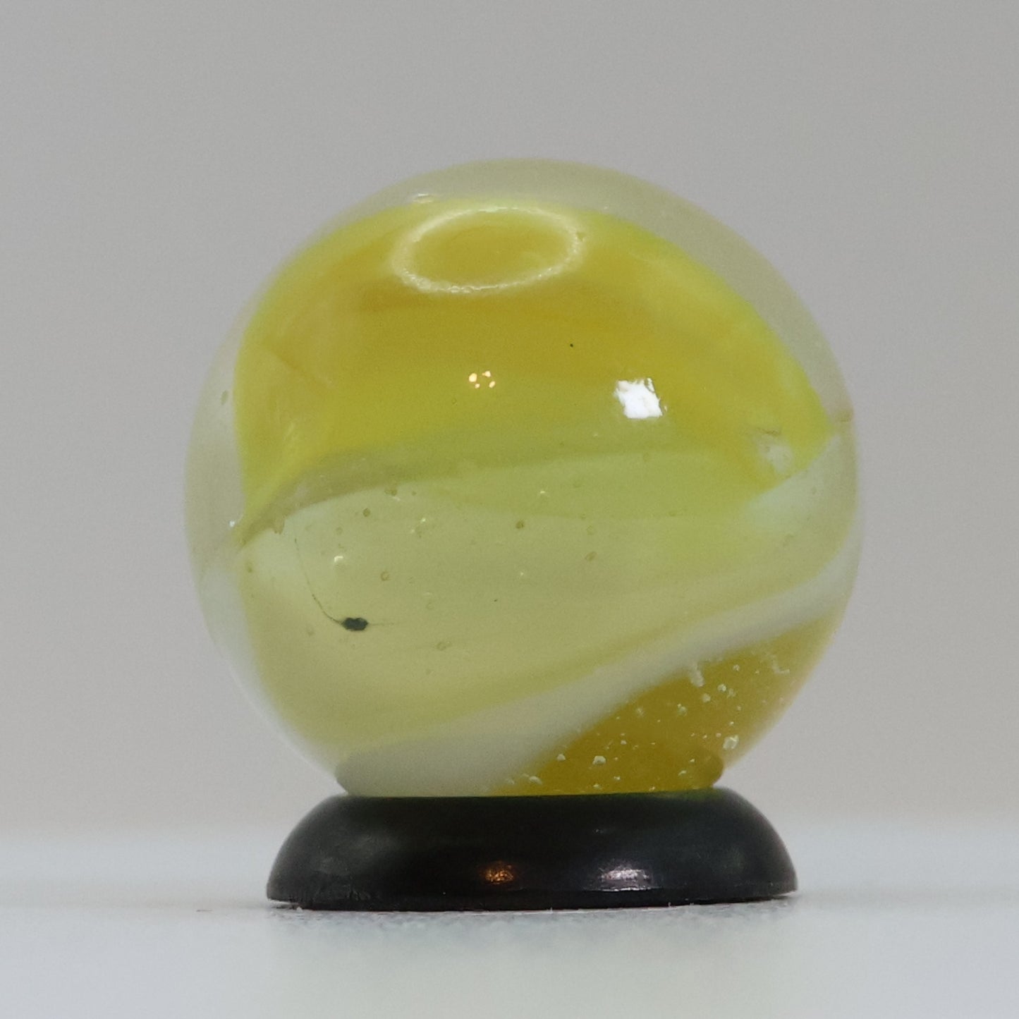 11/16" Peliter Rainbo Clear Based Marble Yellow & White M-