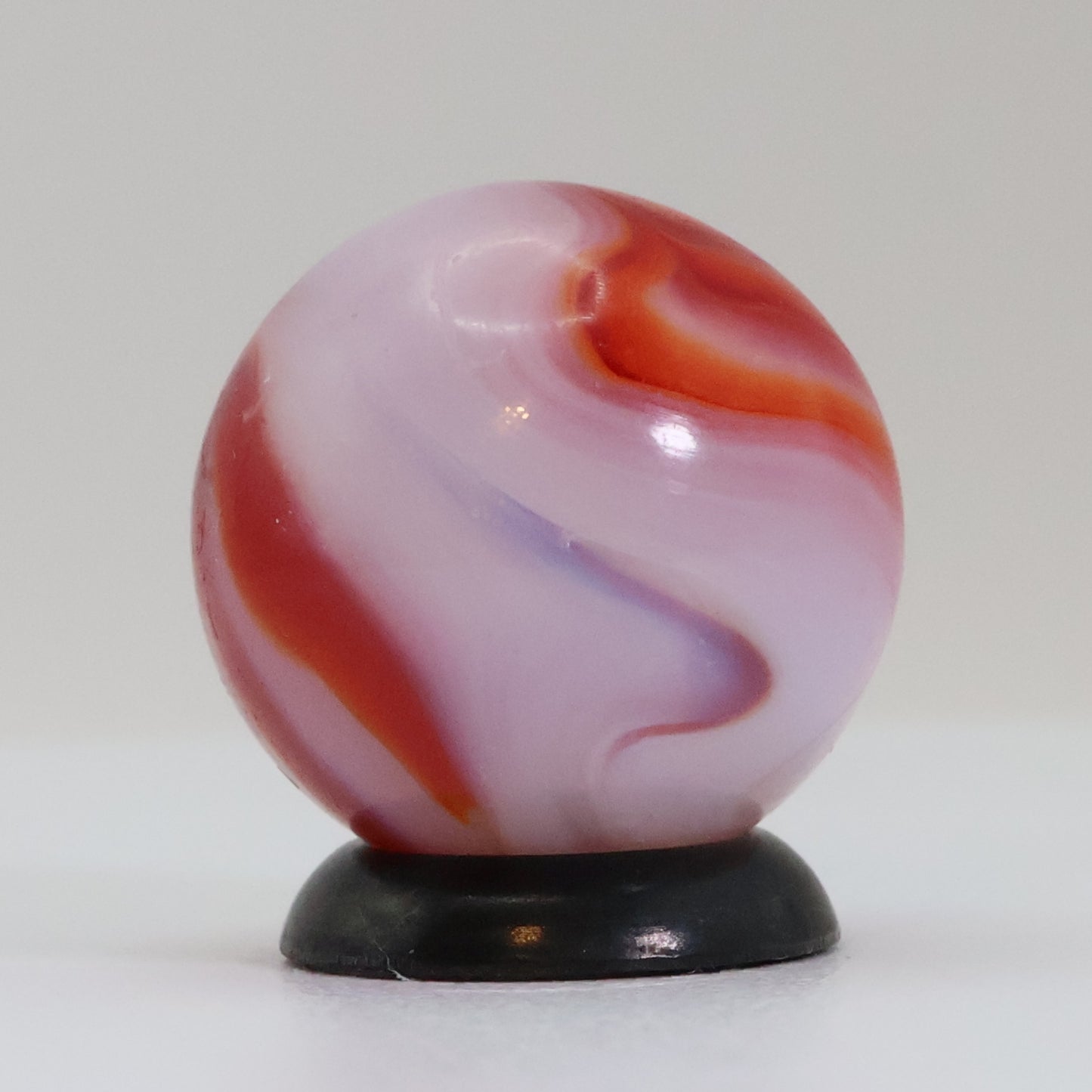 5/8" Swirl marble translucent base w/ red & White ribbons NM+