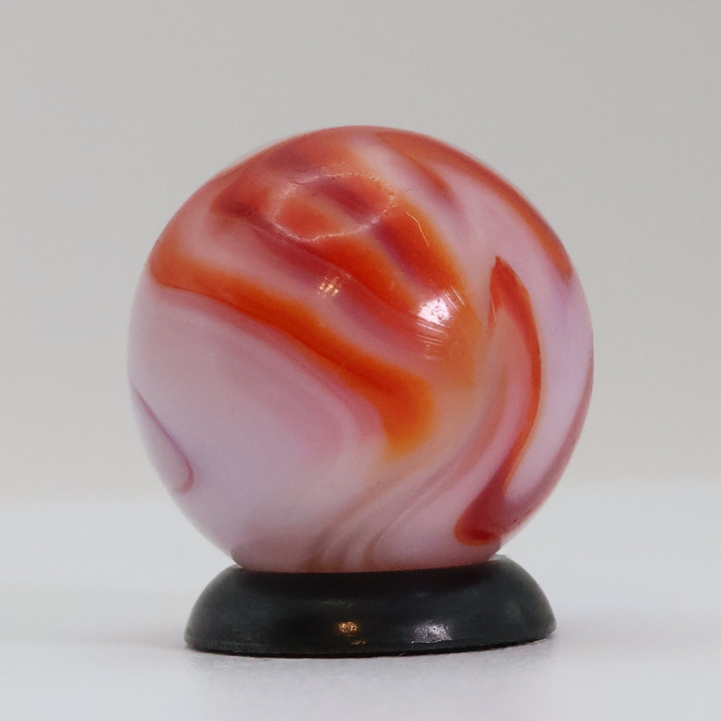 5/8" Swirl marble translucent base w/ red & White ribbons NM+