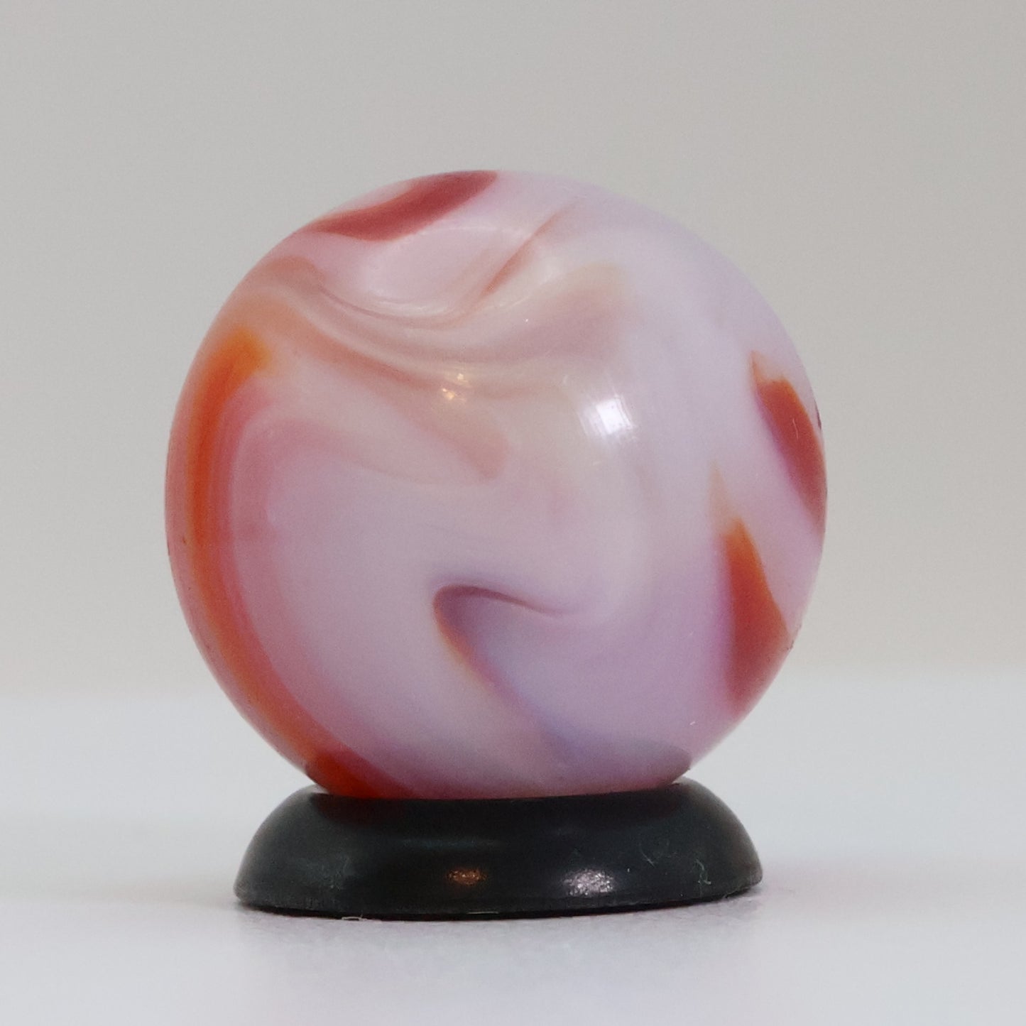 5/8" Swirl marble translucent base w/ red & White ribbons NM+