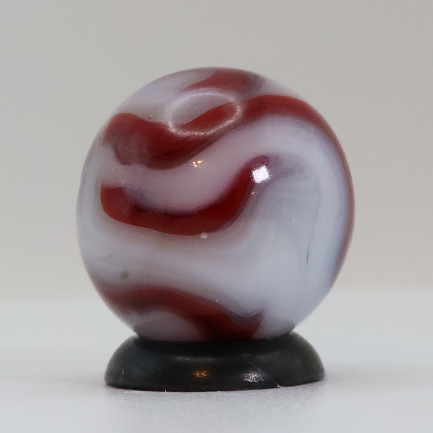 5/8" Swirl Marble Red Calligraphy on White Base NM
