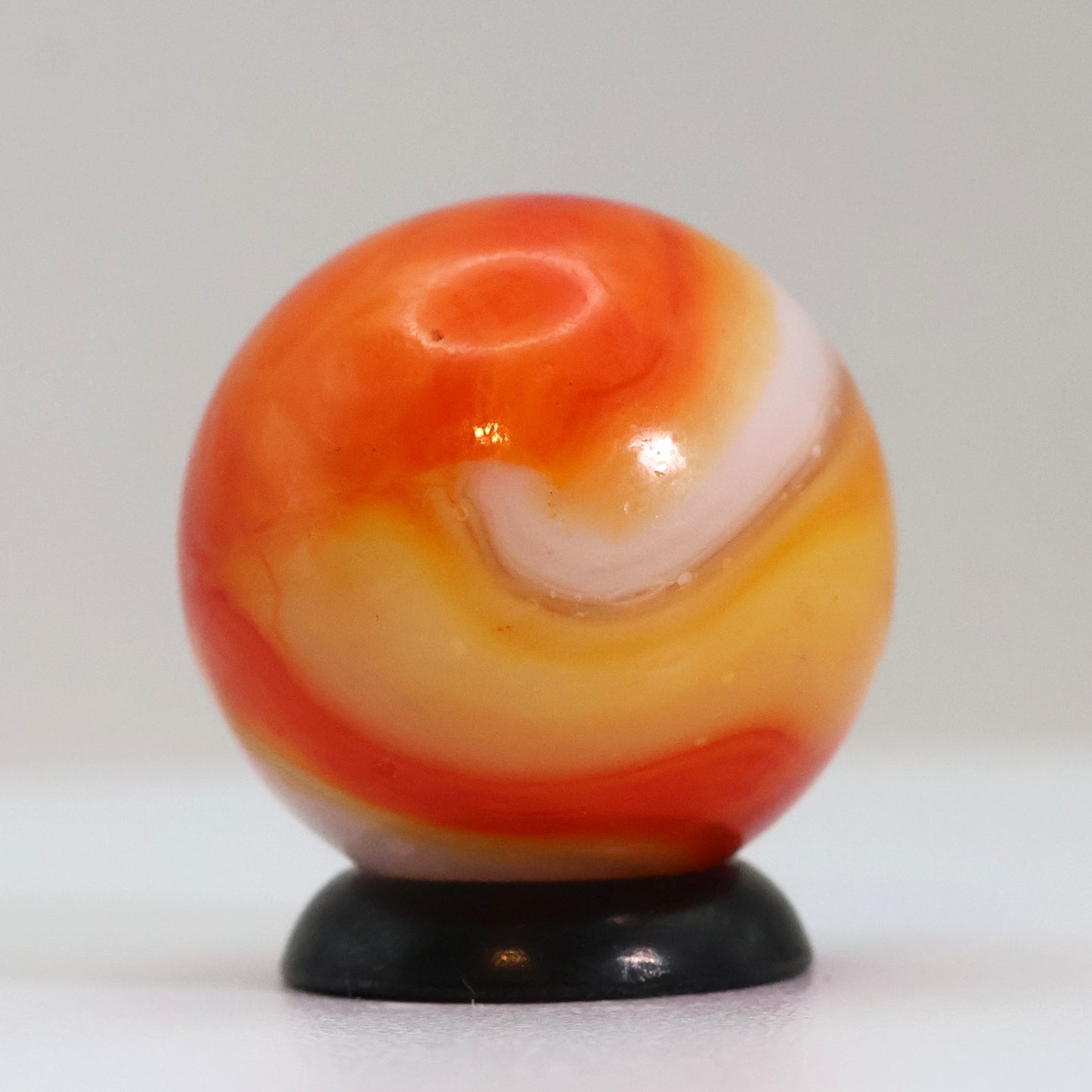 11/16" Peltier Rainbo Marble Orange & White NM