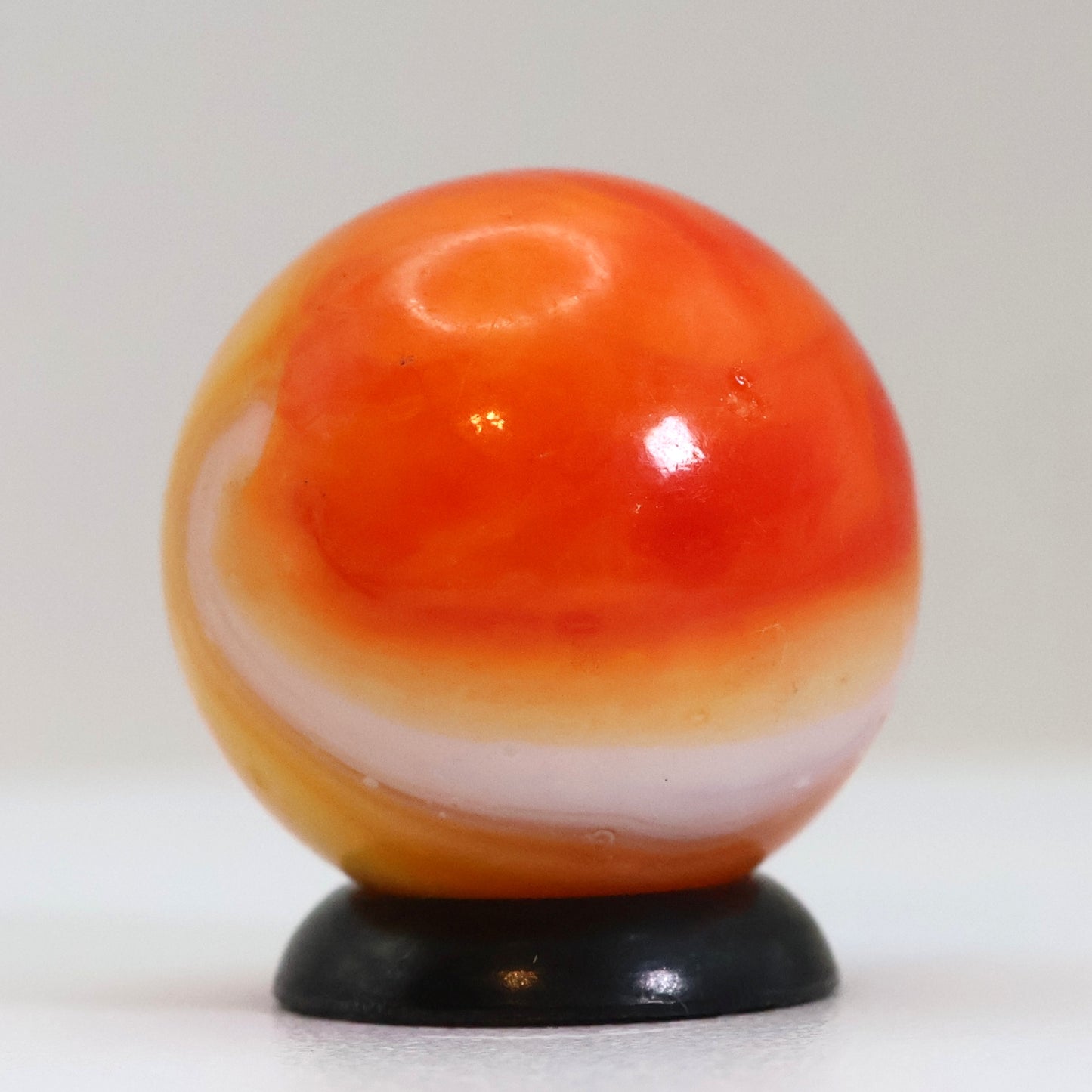 11/16" Peltier Rainbo Marble Orange & White NM