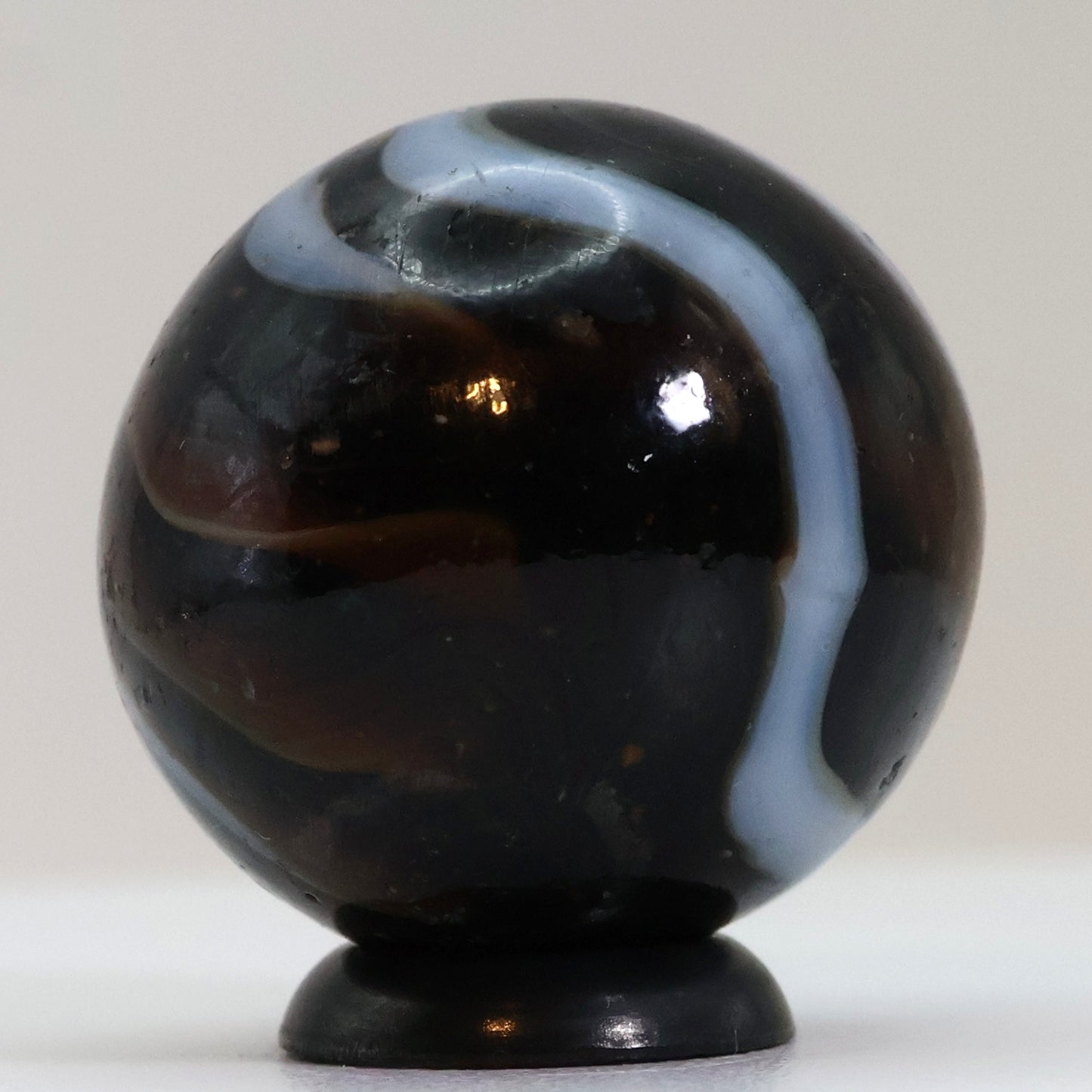 7/8" Swirl Marble Alley? Translucent Brown Base w/white ribbons NM-