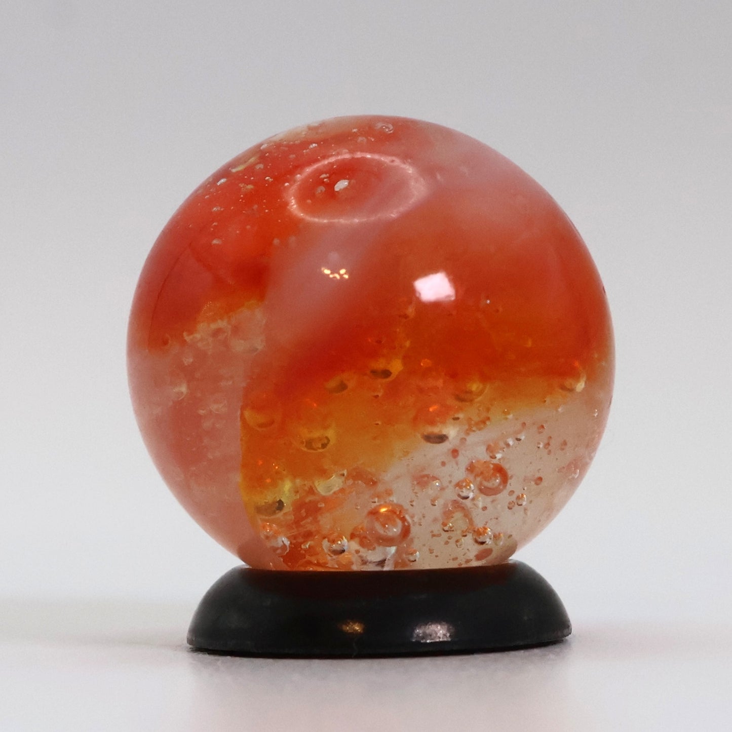 5/8" Peltier Rainbo Sunset Orange w/ different different size bubbles NM+