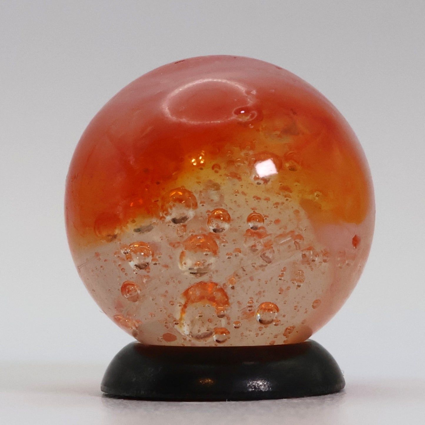 5/8" Peltier Rainbo Sunset Orange w/ different different size bubbles NM+