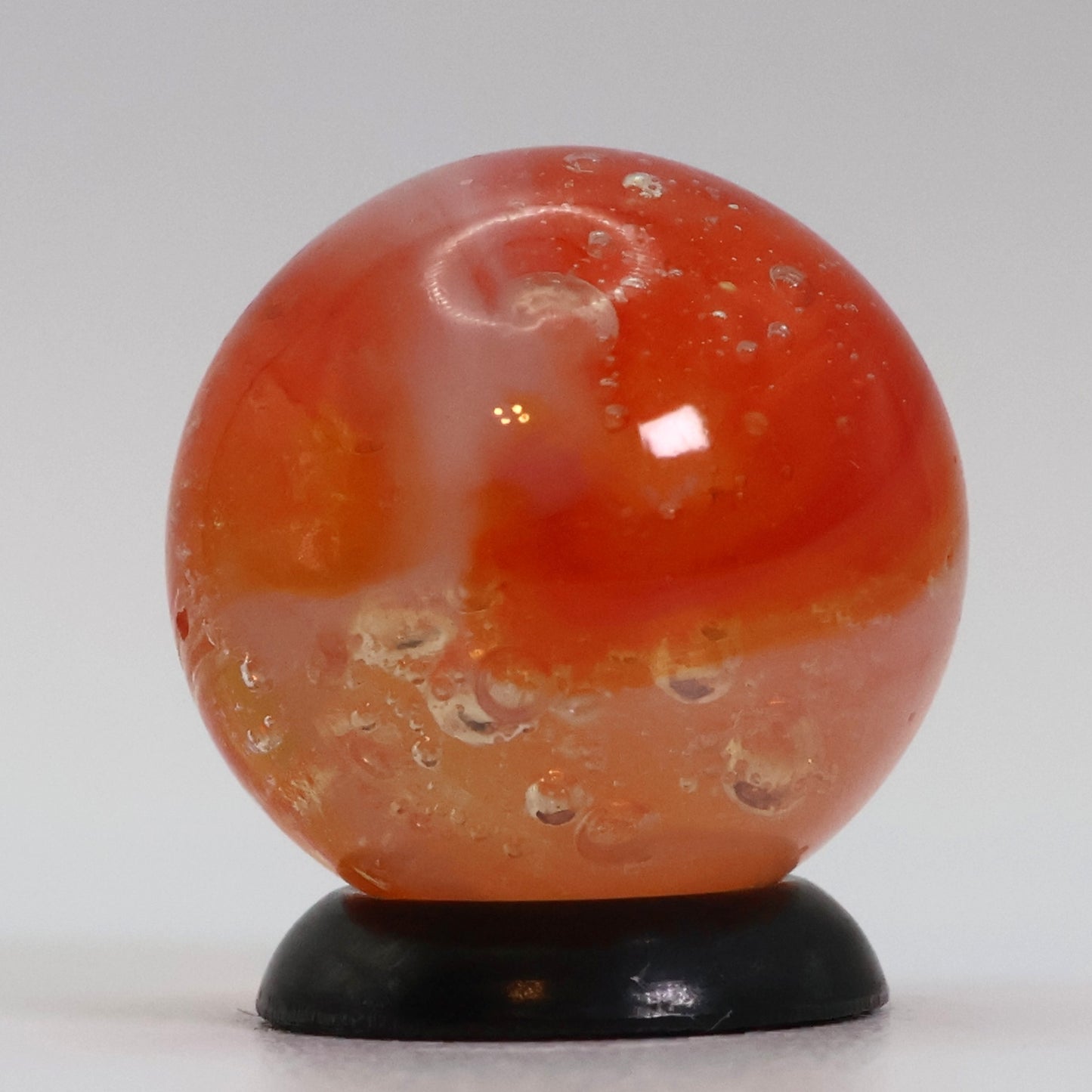 5/8" Peltier Rainbo Sunset Orange w/ different different size bubbles NM+