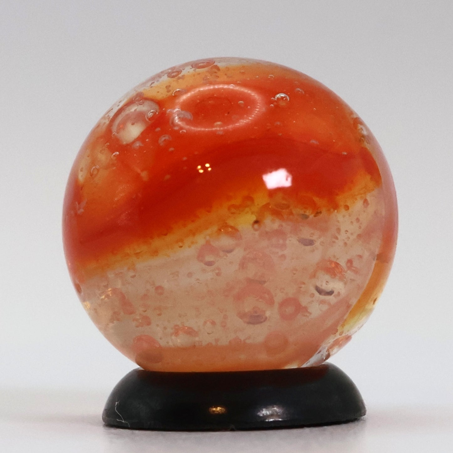 5/8" Peltier Rainbo Sunset Orange w/ different different size bubbles NM+