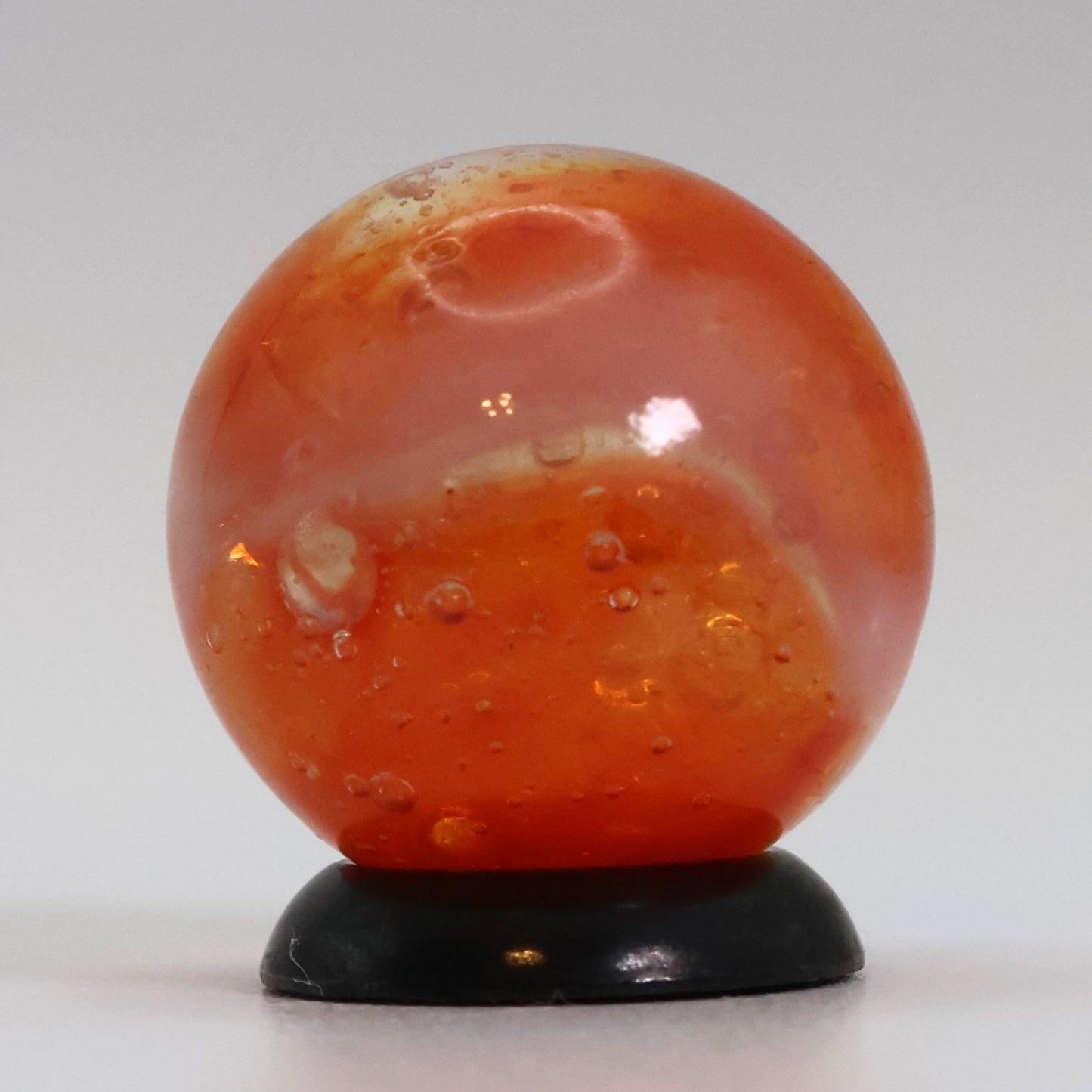 5/8" Peltier Rainbo Sunset Orange w/ different different size bubbles NM+