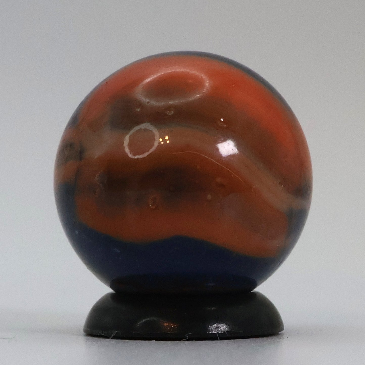 11/16" Peltier Rainbo Translucent Blue Base w/peach ribbons NM+