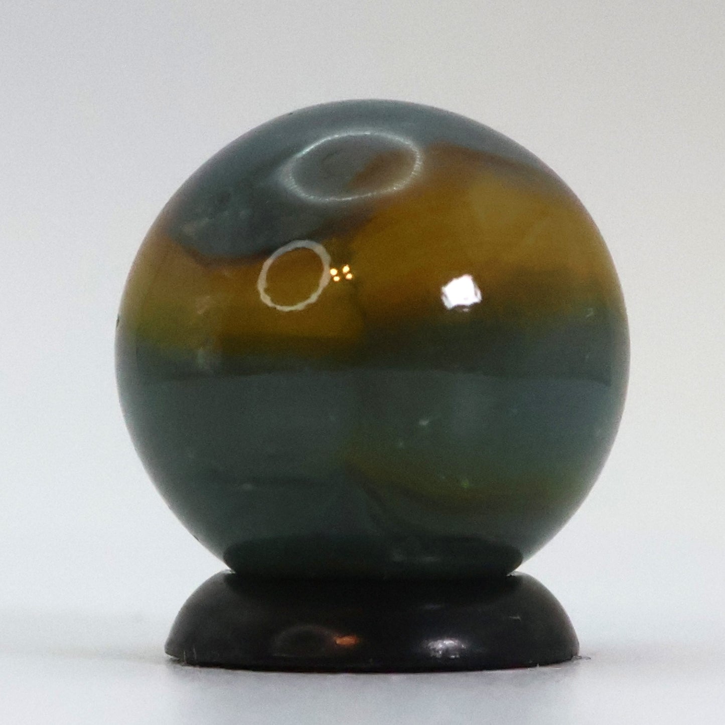 5/8" Peltier Rainbo Marble, Cloudy gray base with yellow ribbons NM+