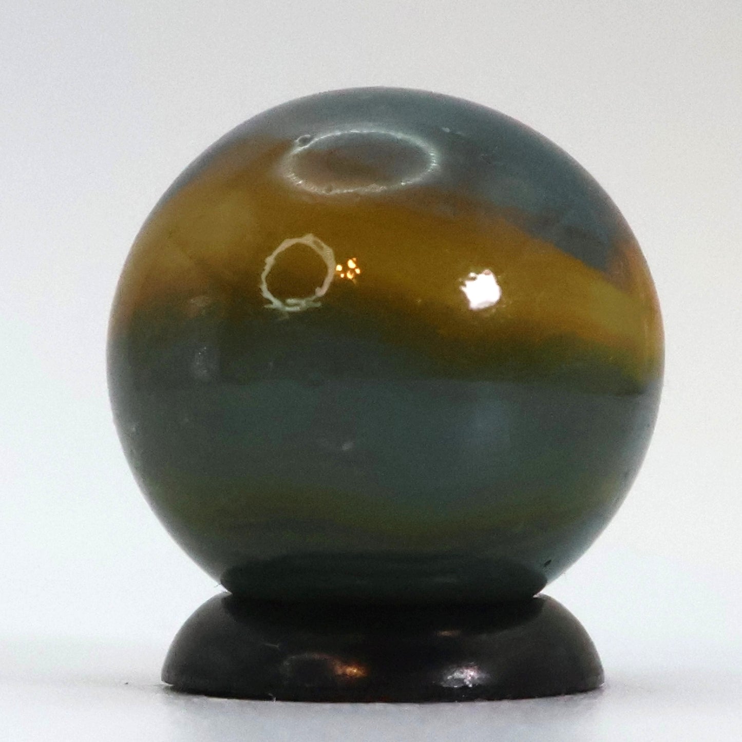 5/8" Peltier Rainbo Marble, Cloudy gray base with yellow ribbons NM+