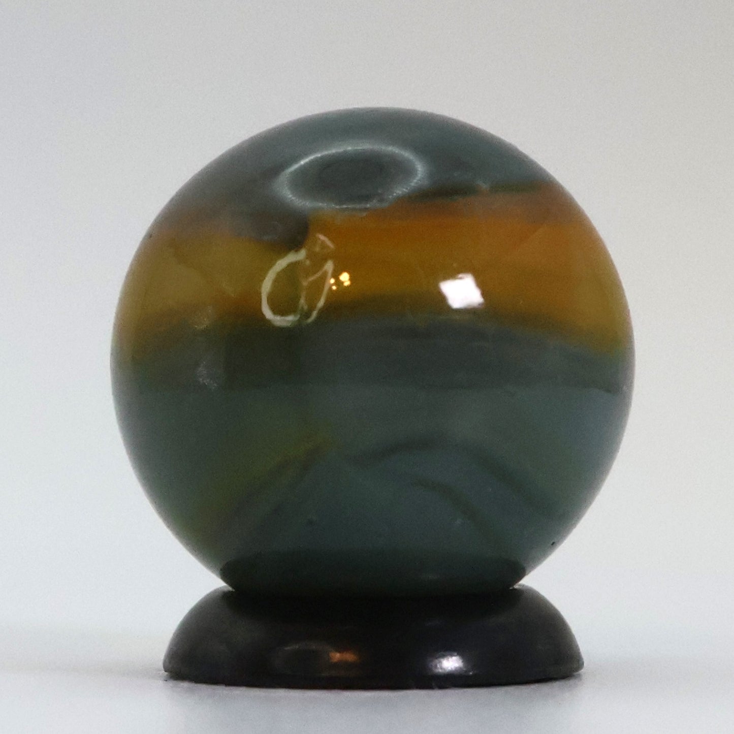 5/8" Peltier Rainbo Marble, Cloudy gray base with yellow ribbons NM+