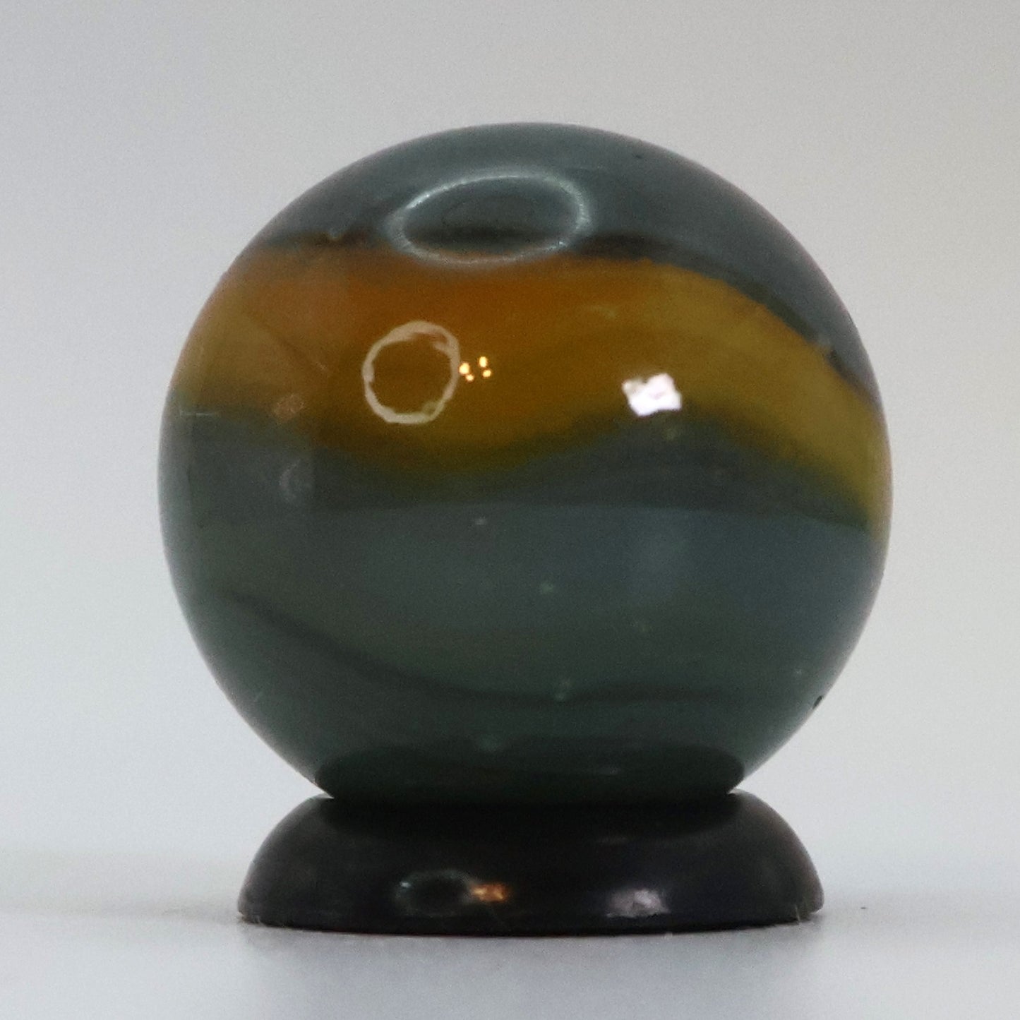 5/8" Peltier Rainbo Marble, Cloudy gray base with yellow ribbons NM+