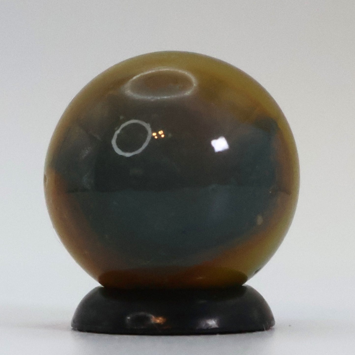5/8" Peltier Rainbo Marble, Cloudy gray base with yellow ribbons NM+