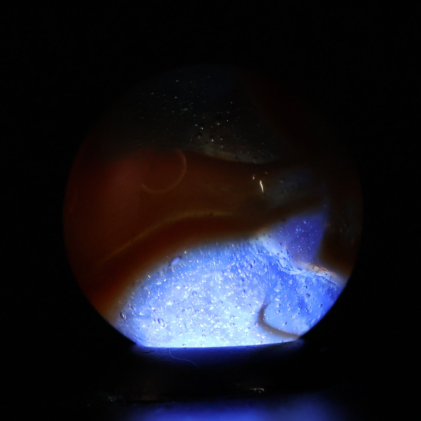 11/16" Peltier Rainbo Translucent Blue Base w/peach ribbons NM+