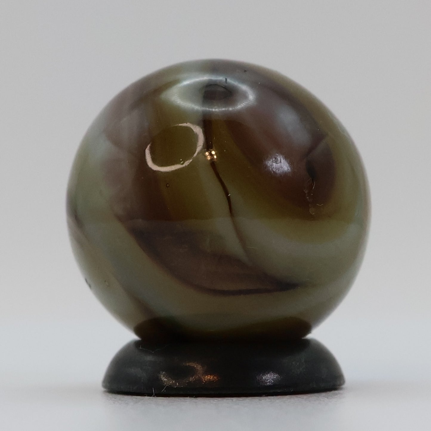 5/8" Swirl Marble, clear based brown & purple NM+