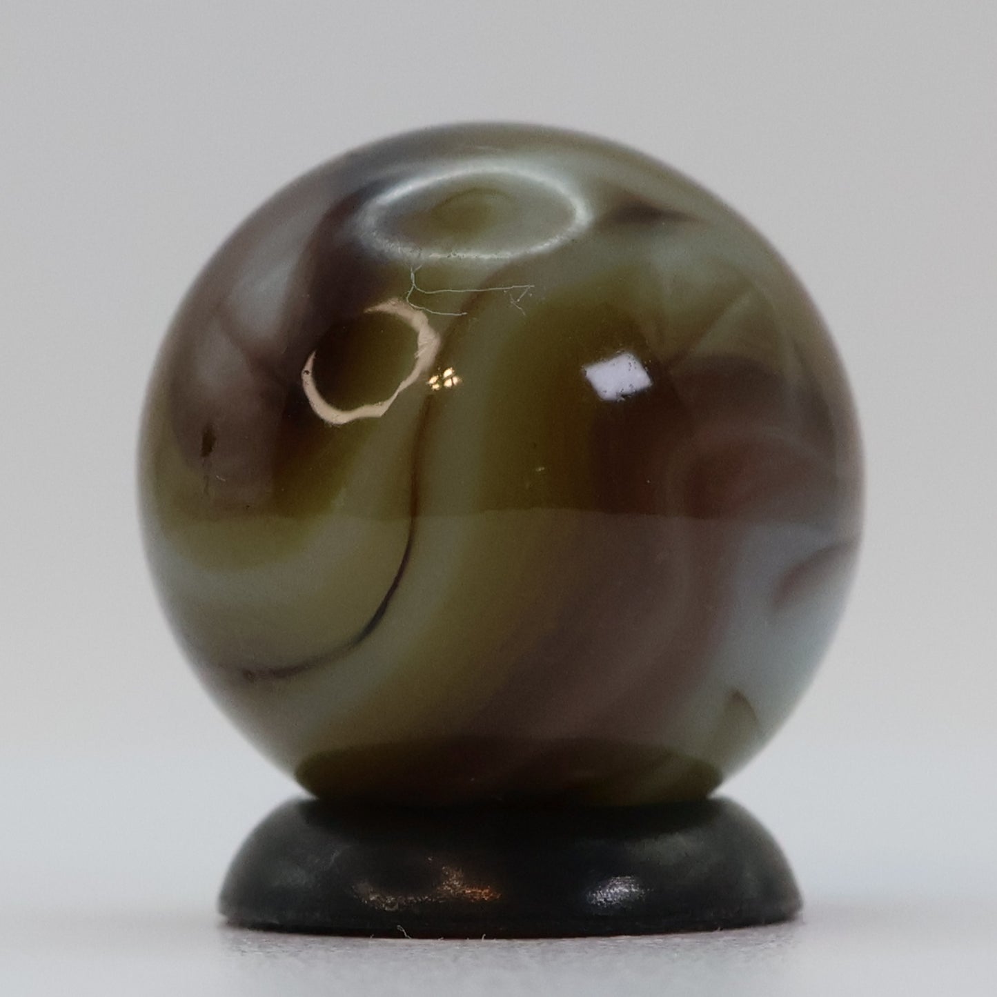 5/8" Swirl Marble, clear based brown & purple NM+