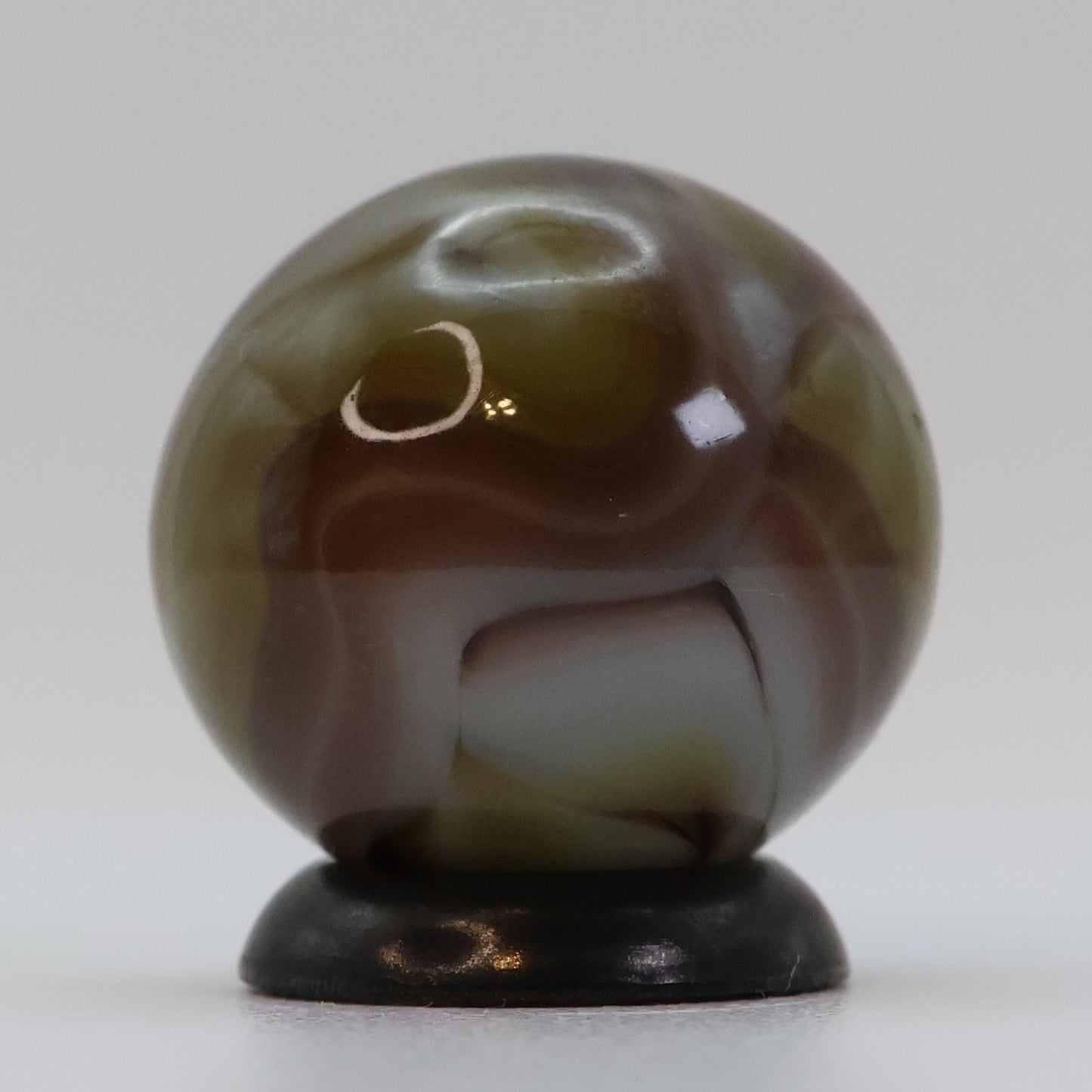 5/8" Swirl Marble, clear based brown & purple NM+
