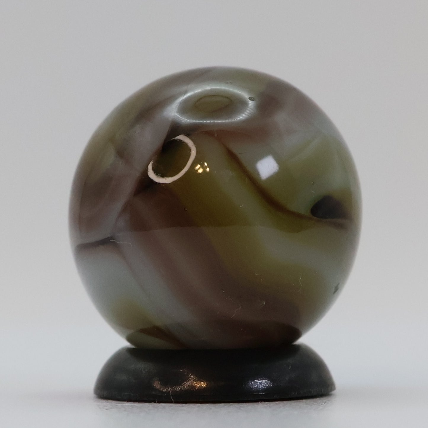 5/8" Swirl Marble, clear based brown & purple NM+