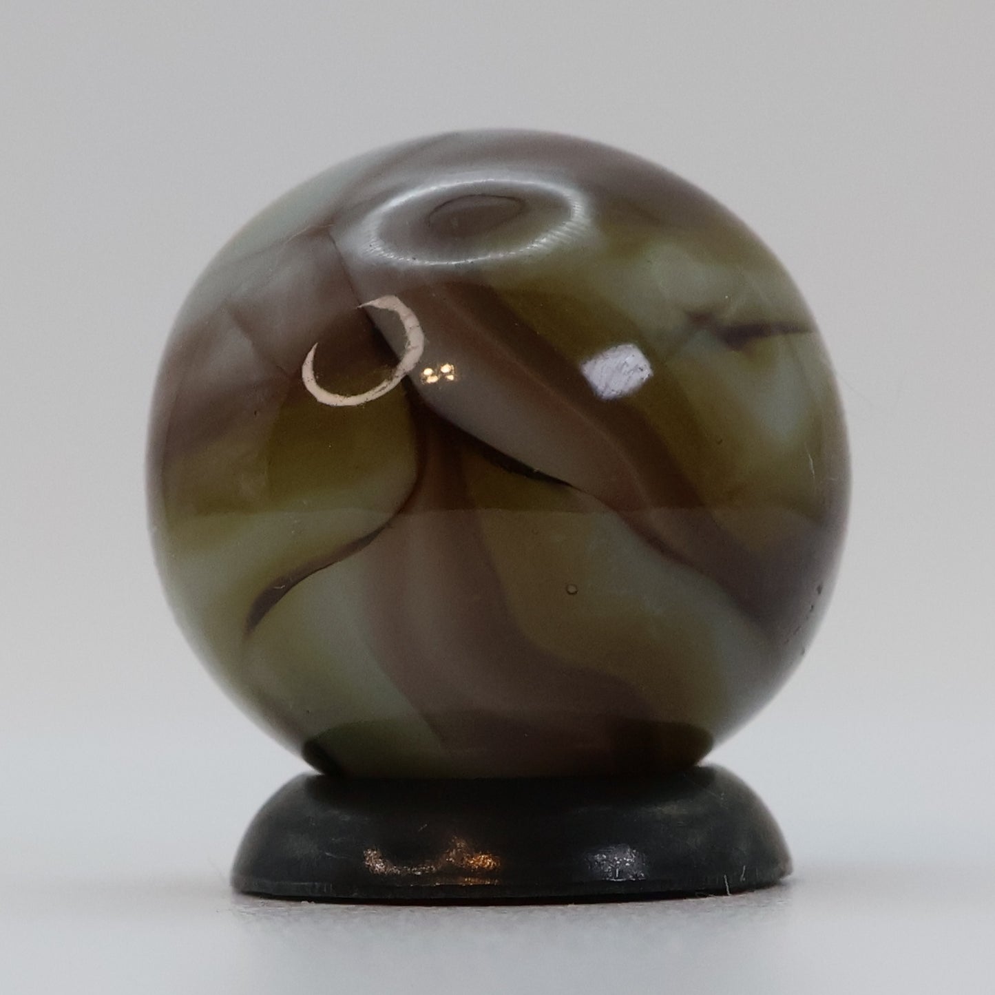 5/8" Swirl Marble, clear based brown & purple NM+