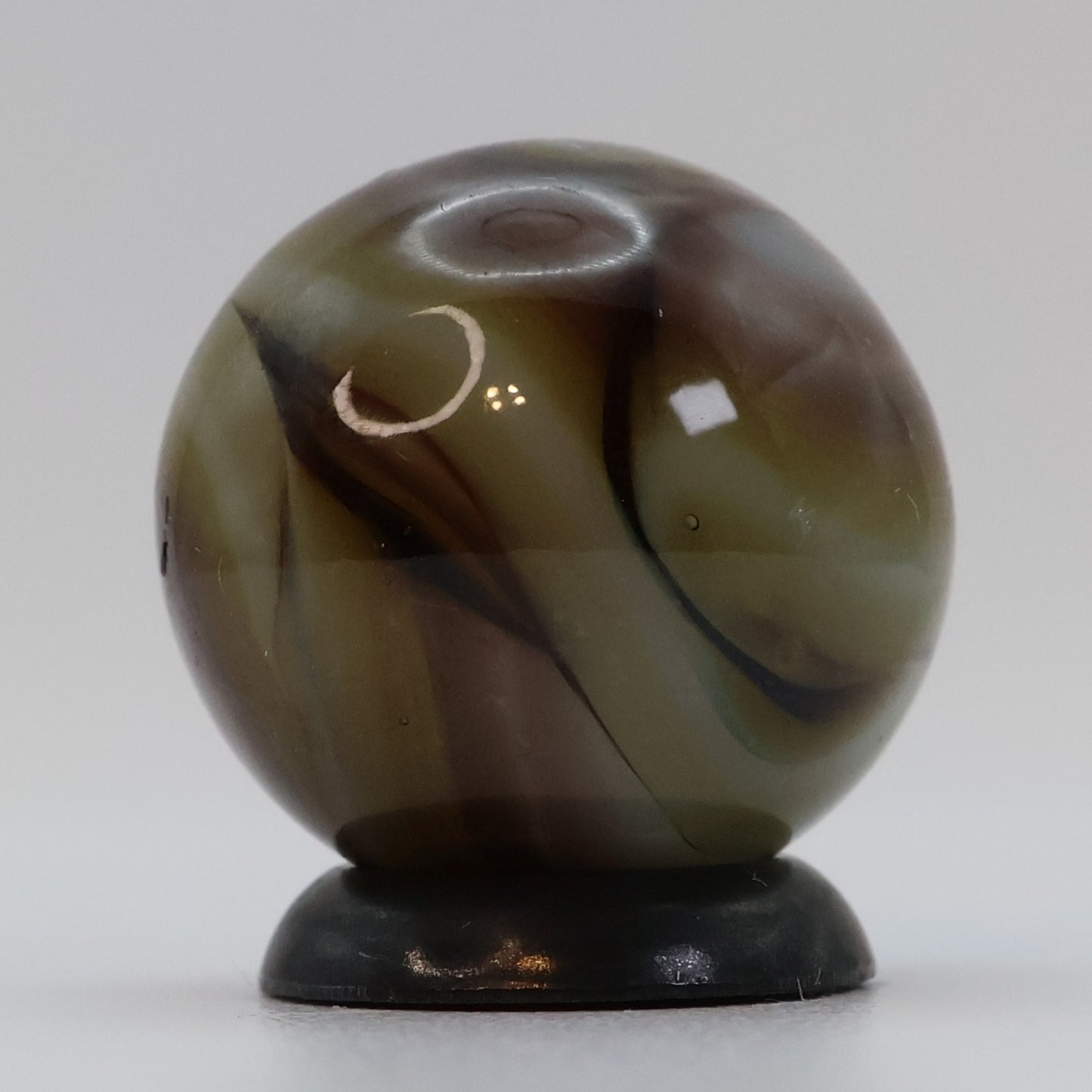 5/8" Swirl Marble, clear based brown & purple NM+