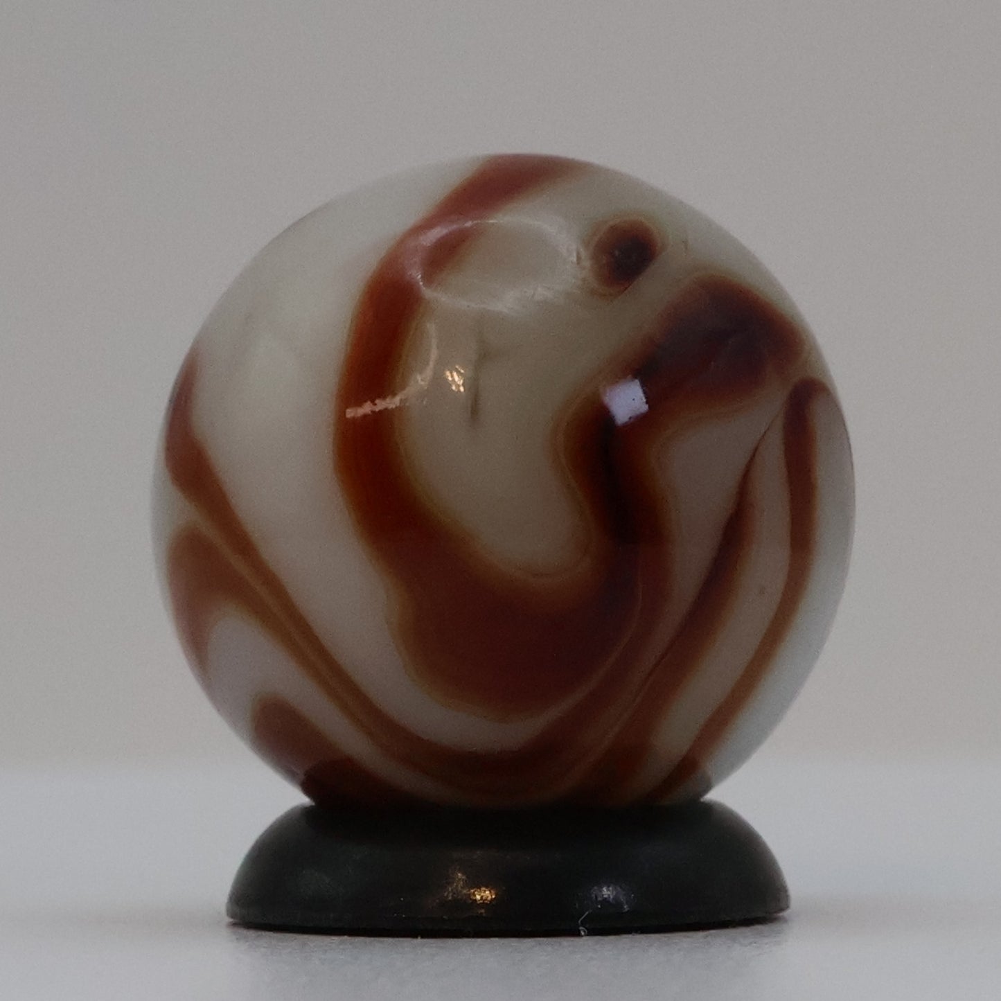 5/8" Swirl Marble Red(Oxblood?) Champion?/ Ravenswood? M-