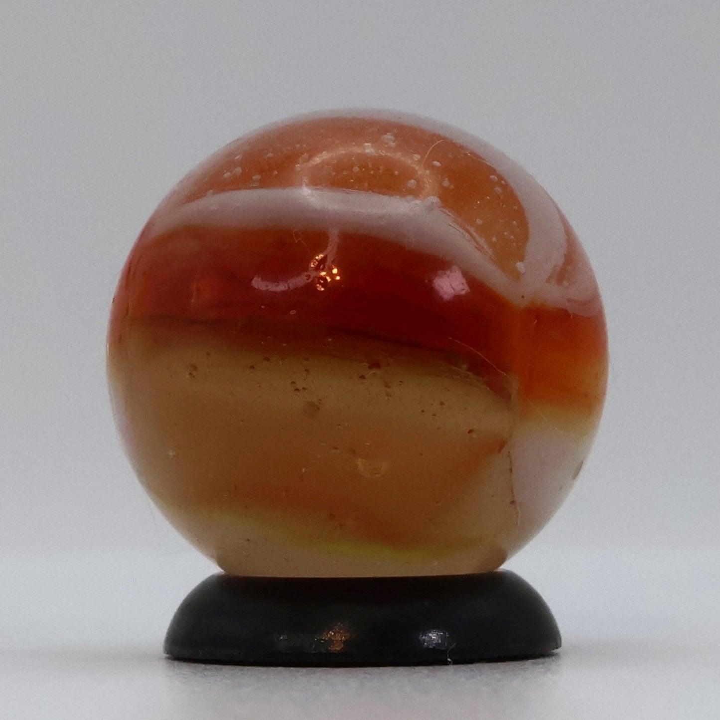 5/8" Peltier Rainbo Marble Clear, Orange, White NM