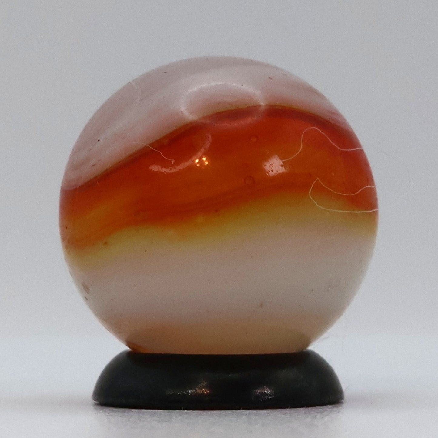 5/8" Peltier Rainbo Marble Clear, Orange, White NM