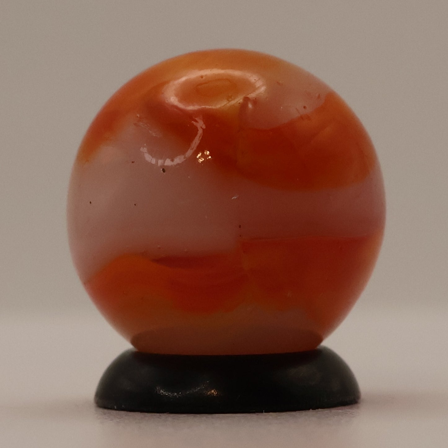 5/8" Peltier Rainbo Translucent base with Orange Ribbons MINT