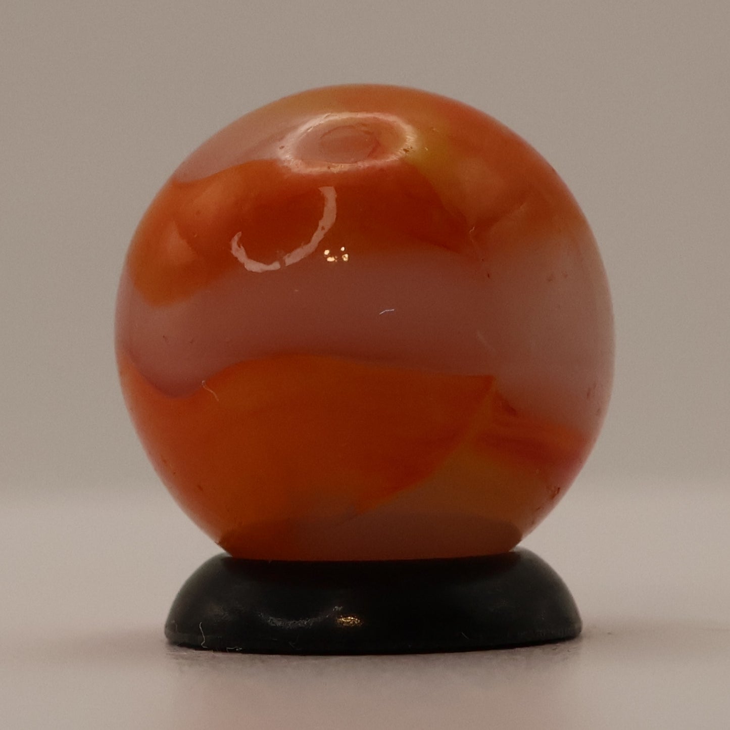 5/8" Peltier Rainbo Translucent base with Orange Ribbons MINT