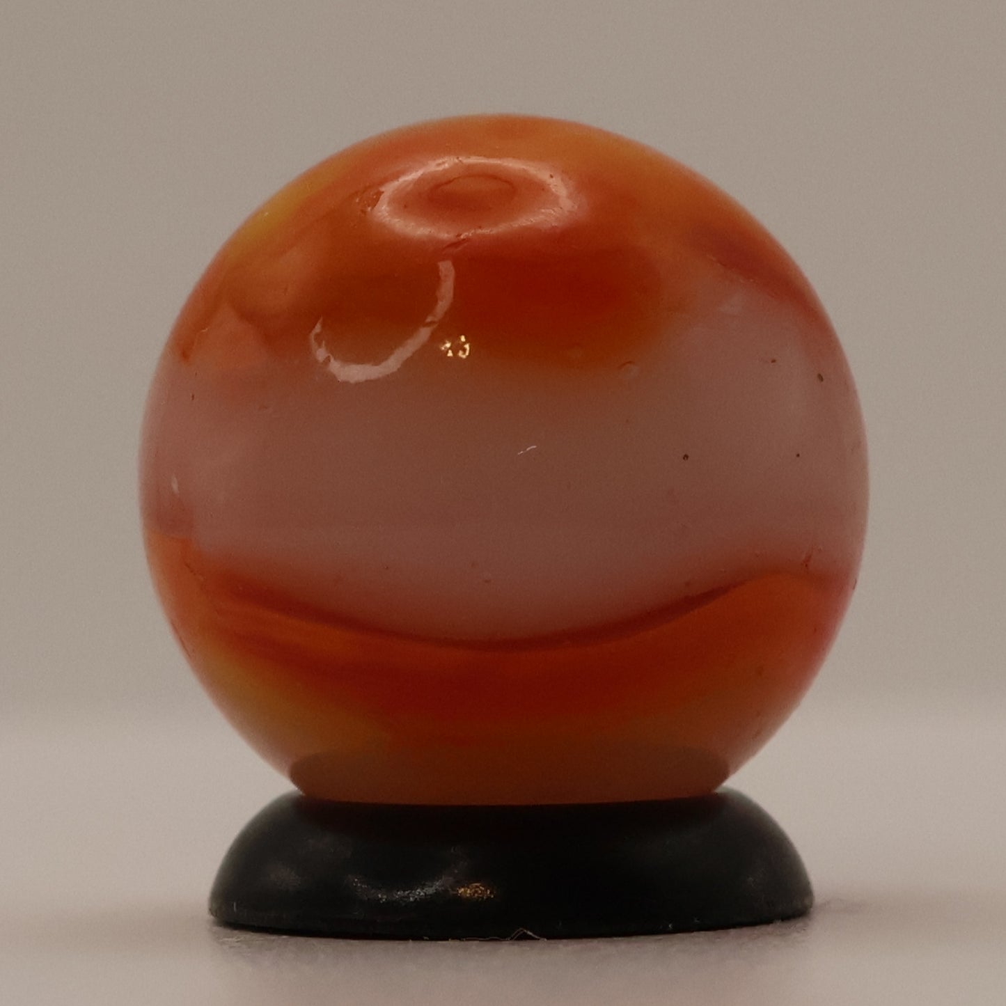 5/8" Peltier Rainbo Translucent base with Orange Ribbons MINT