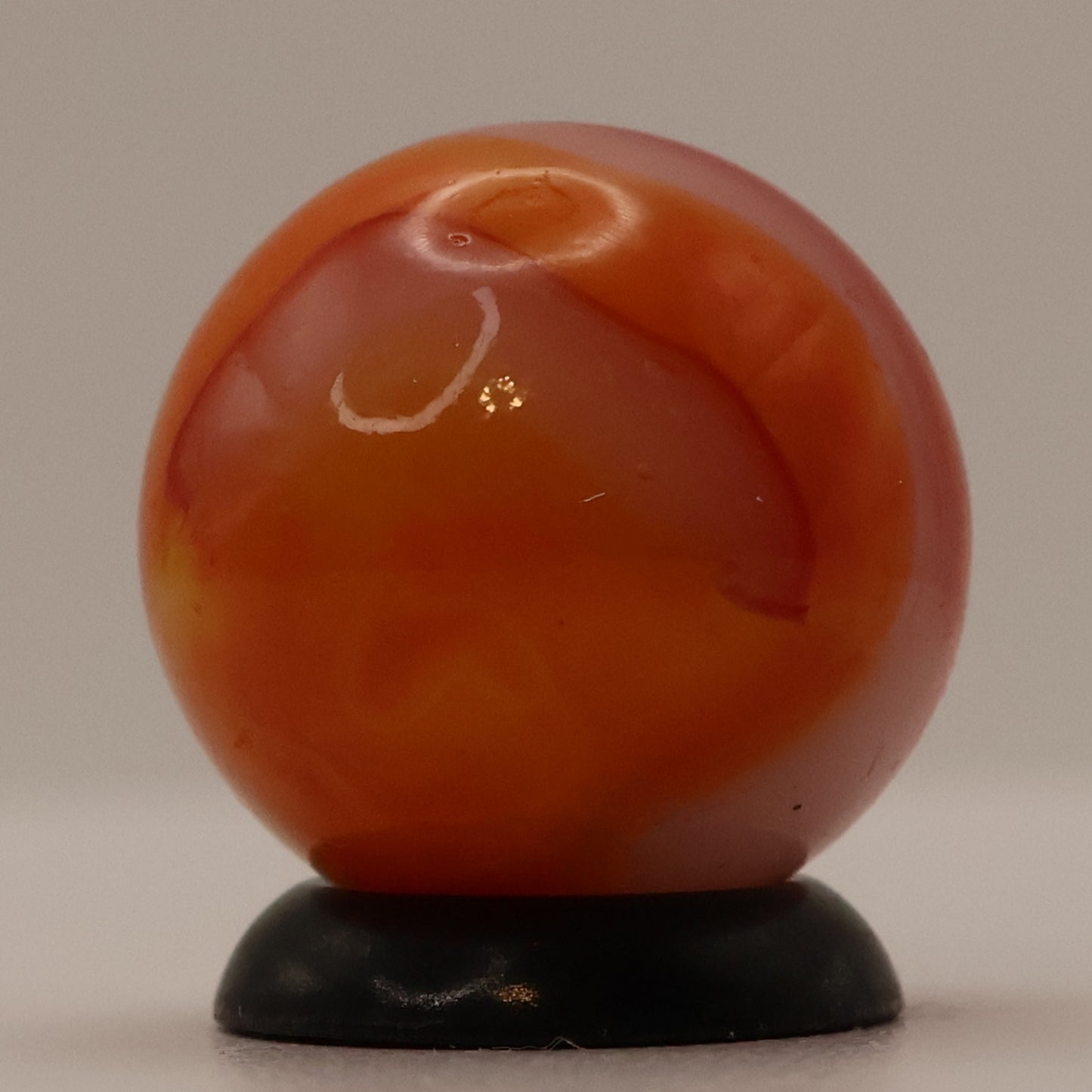 5/8" Peltier Rainbo Translucent base with Orange Ribbons MINT