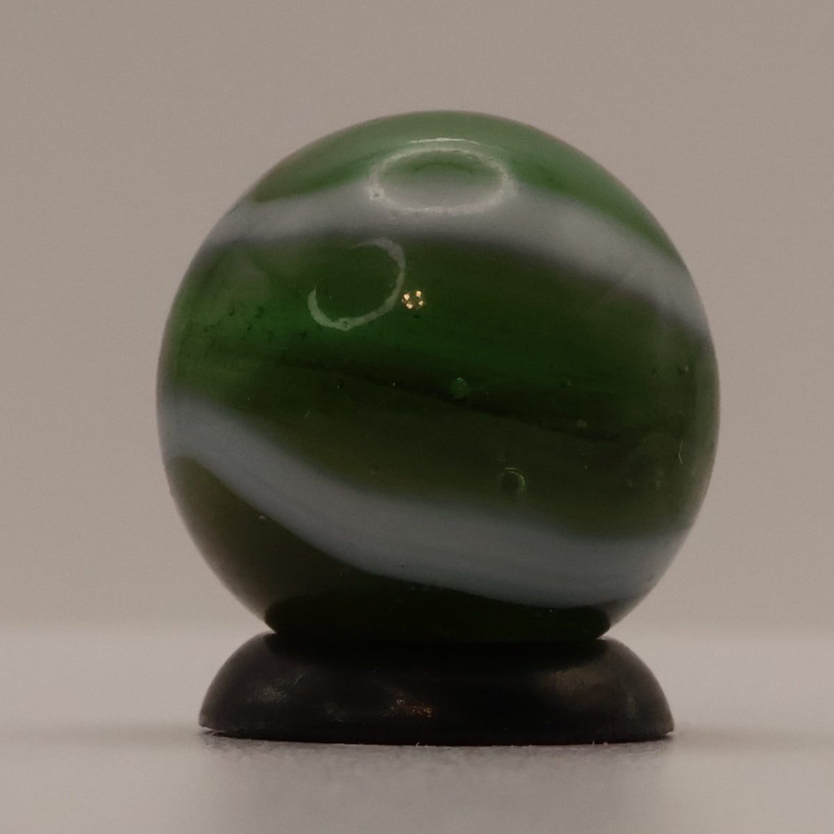 5/8" Peltier Rainbo Marble Translucent Green with white ribbons M-