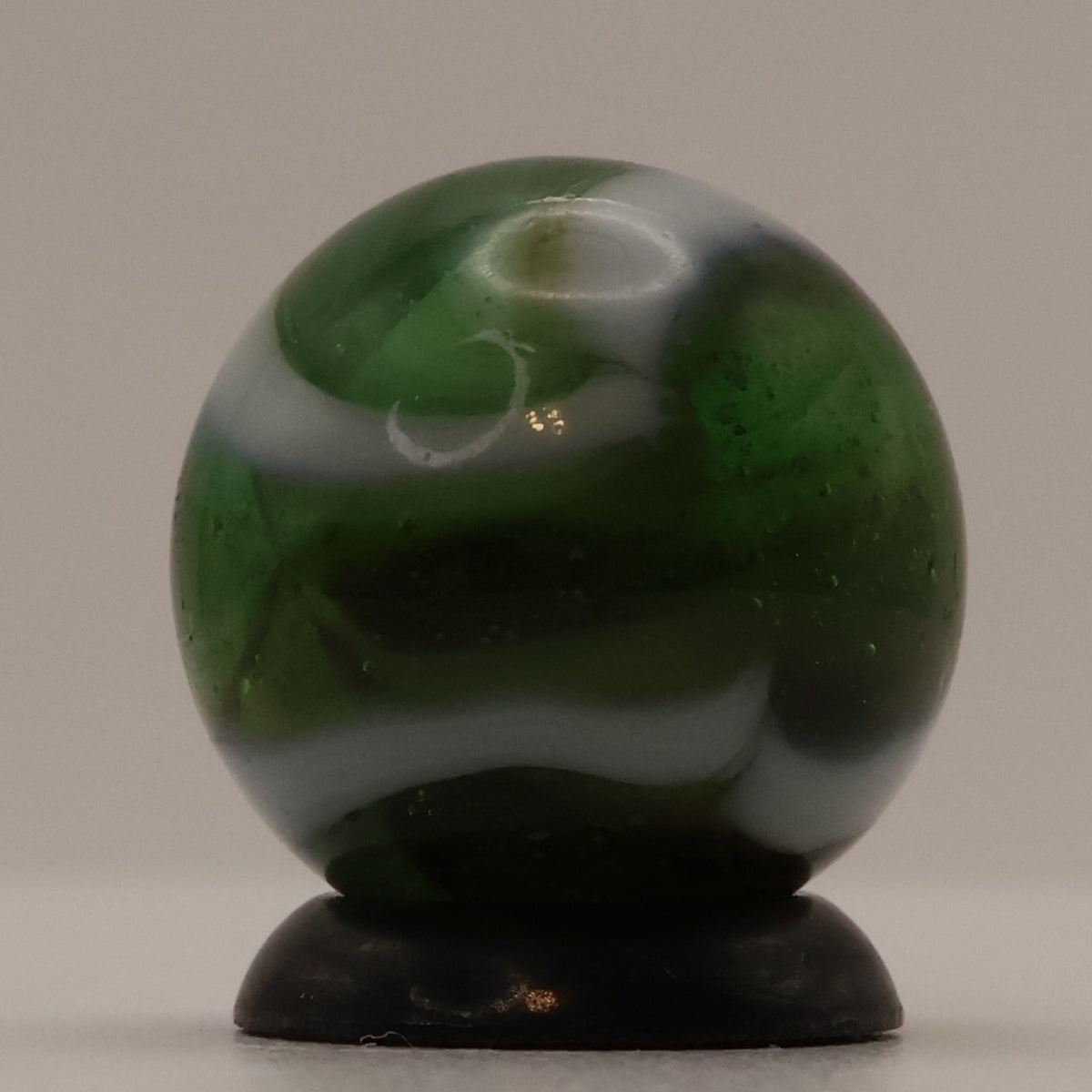 5/8" Peltier Rainbo Marble Translucent Green with white ribbons M-