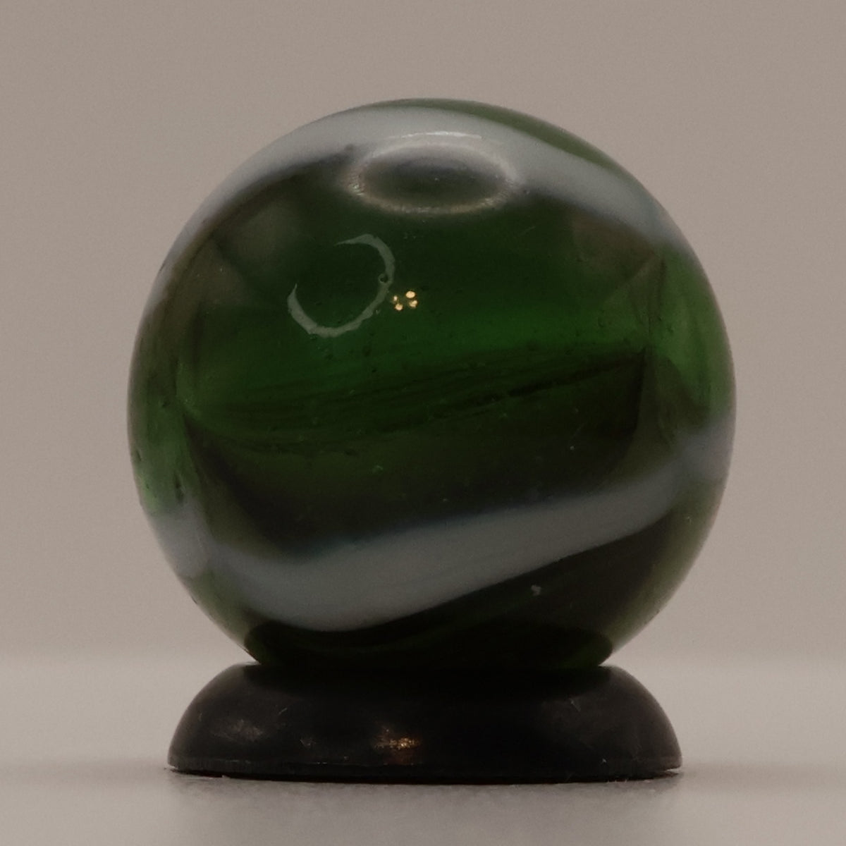 5/8" Peltier Rainbo Marble Translucent Green with white ribbons M-