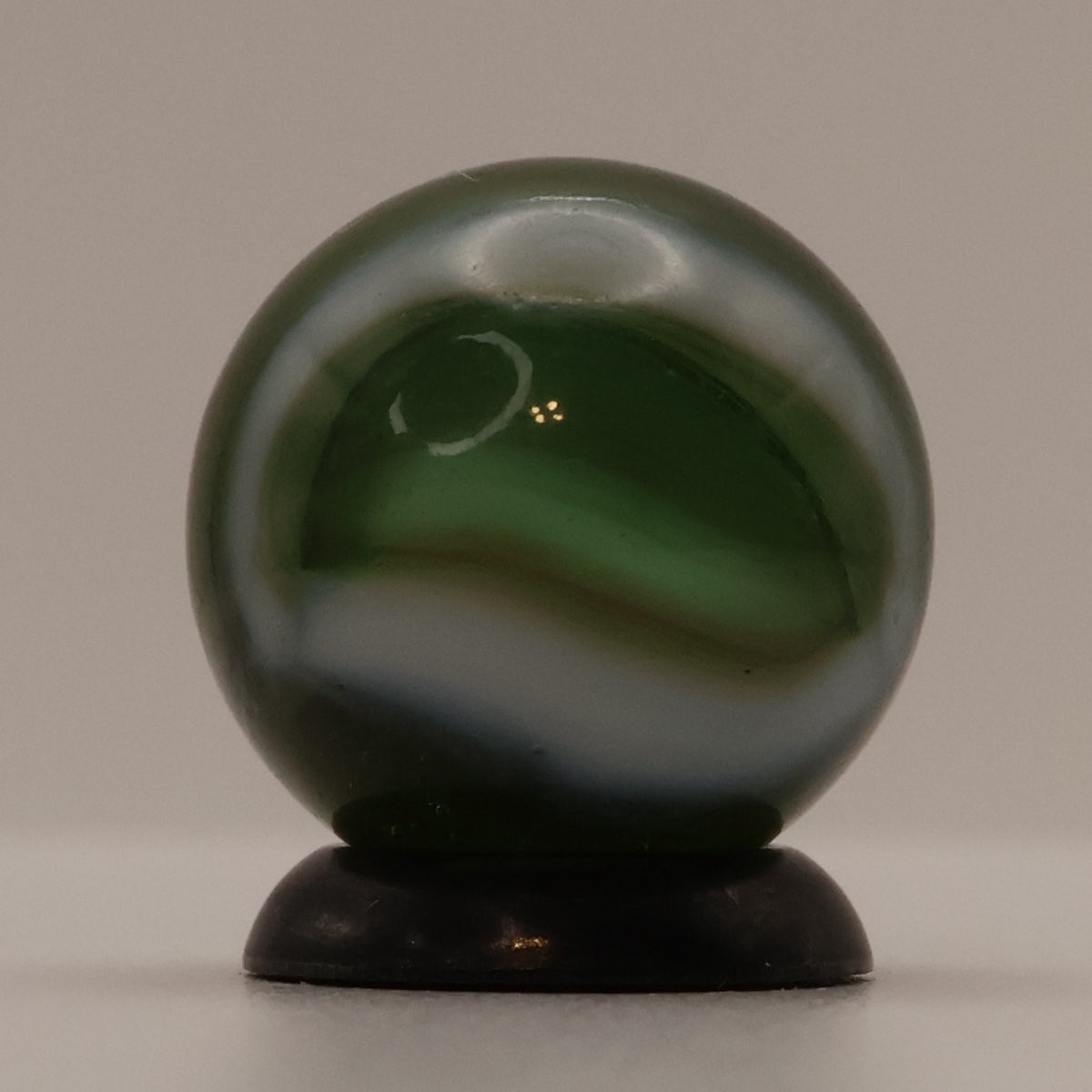 5/8" Peltier Rainbo Marble Translucent Green with white ribbons M-