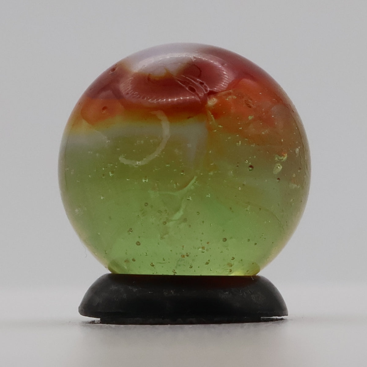 5/8" Peltier Rainbo Clear Based Marble - Translucent Green Base MINT
