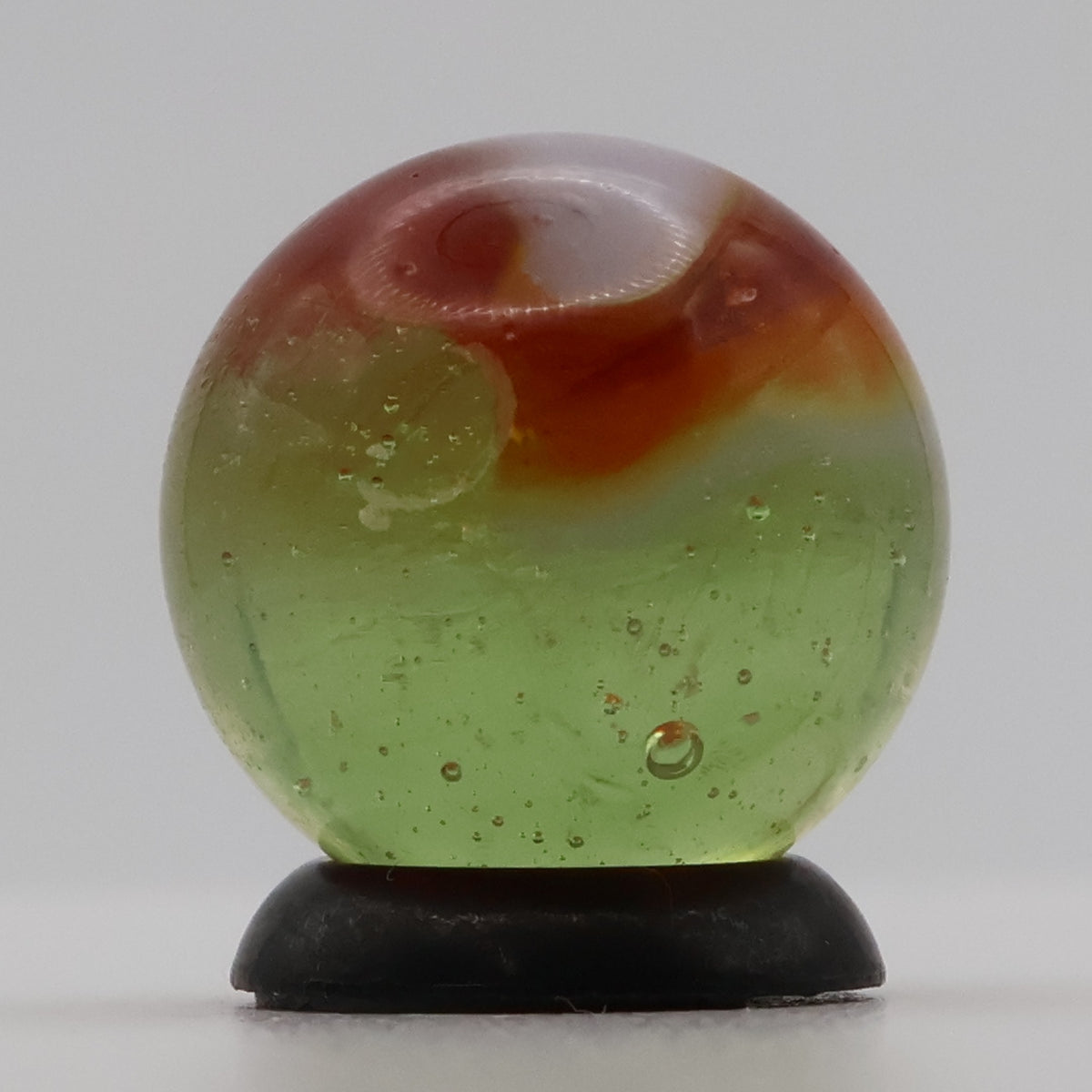 5/8" Peltier Rainbo Clear Based Marble - Translucent Green Base MINT