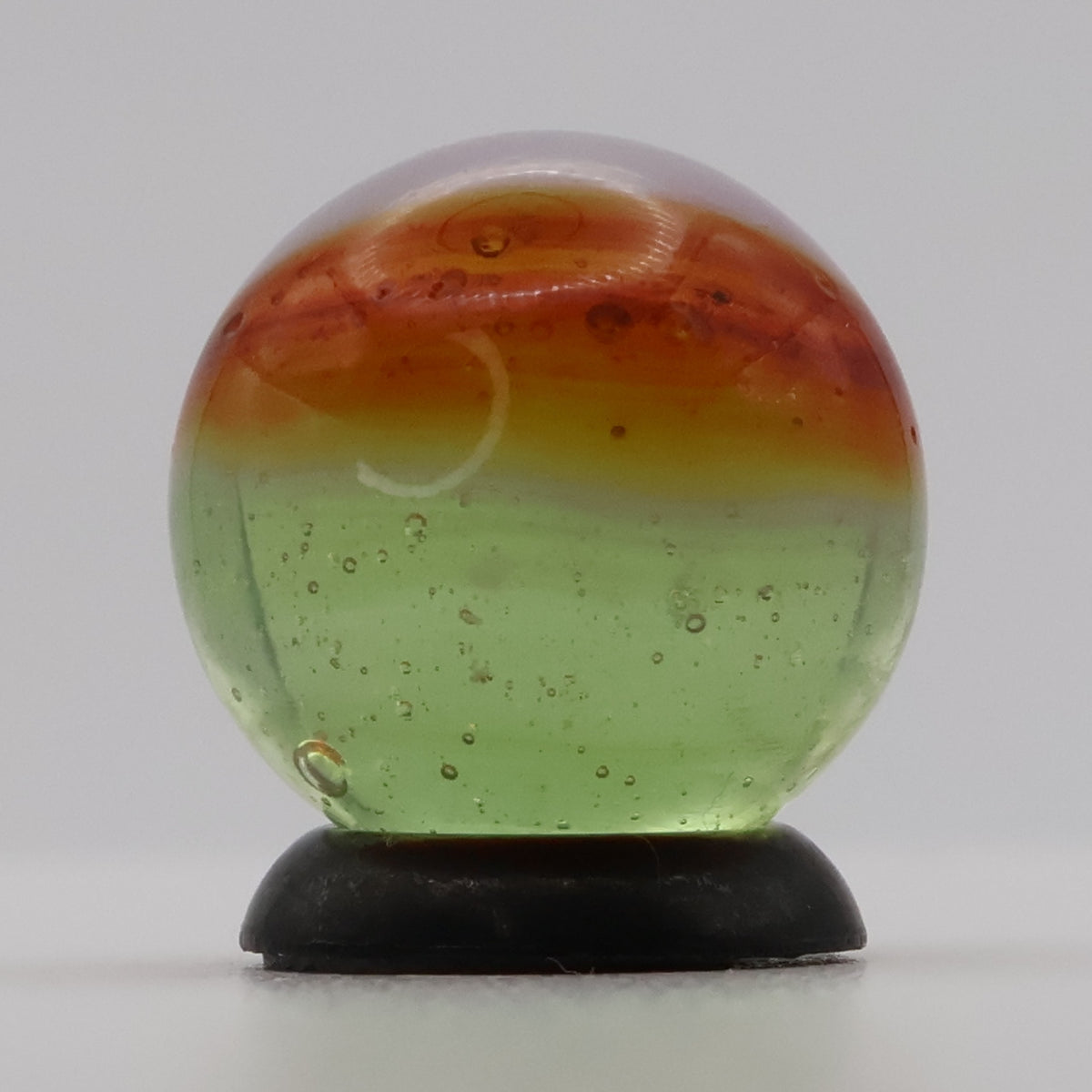 5/8" Peltier Rainbo Clear Based Marble - Translucent Green Base MINT