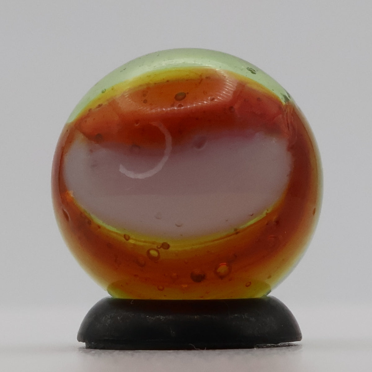 5/8" Peltier Rainbo Clear Based Marble - Translucent Green Base MINT