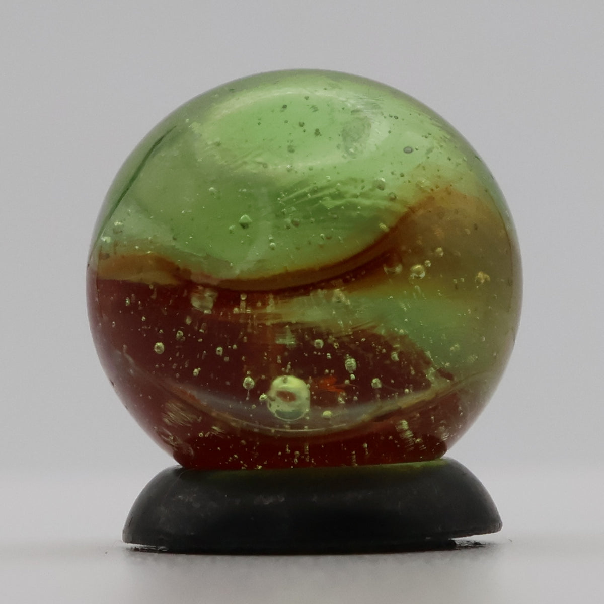 ~9/16" Peltier Rainbo Clear Based Marble - Translucent Green Base NM+